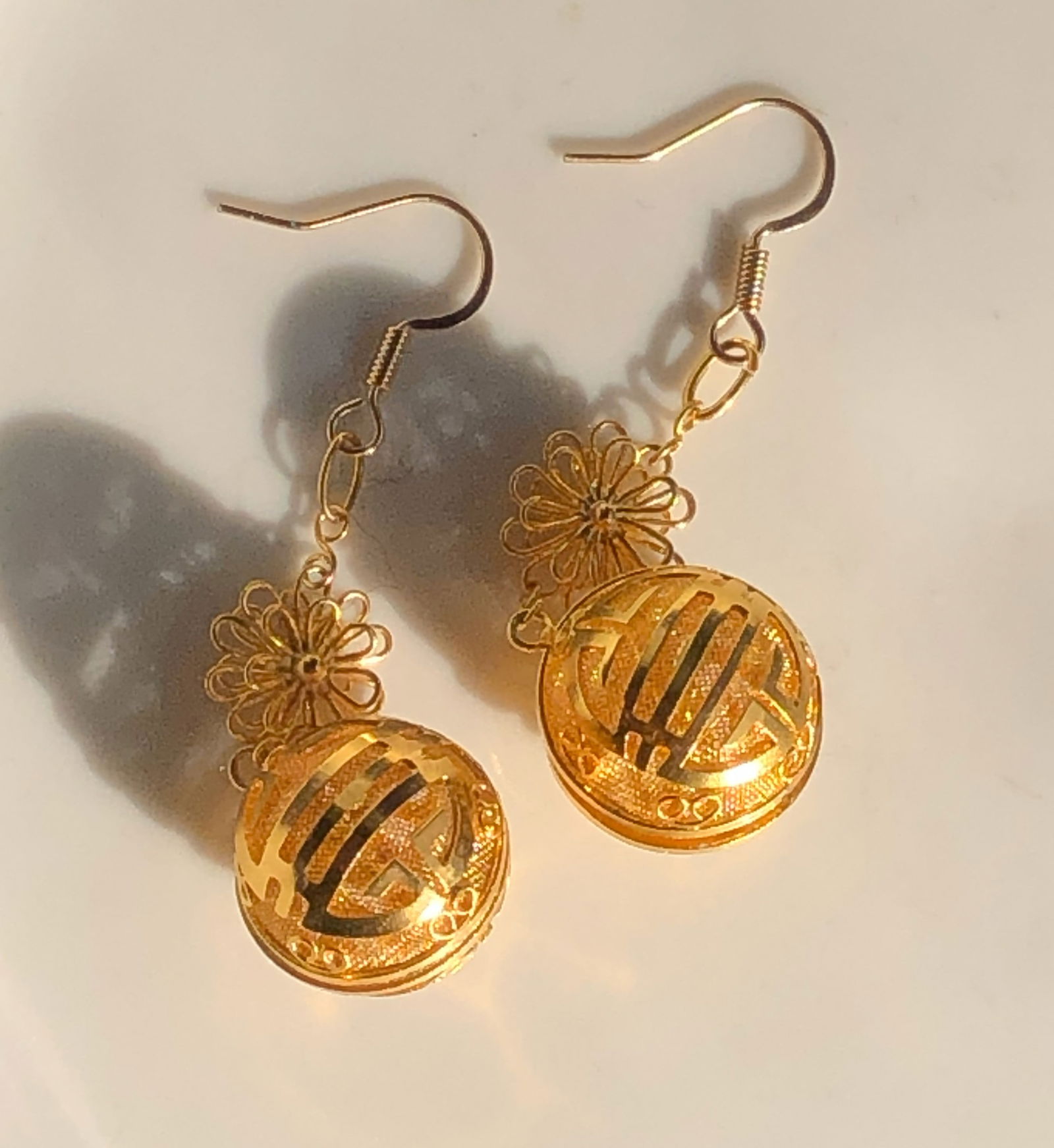 Gold Filled Filigree Earrings: Elegant gold filled filigree earrings with intricate design.