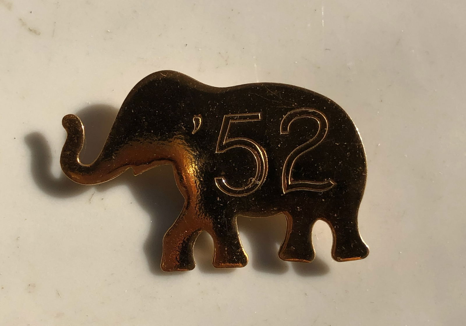 Elephant Pin '52: A vintage elephant-shaped pin with '52 engraved. Size: 2".