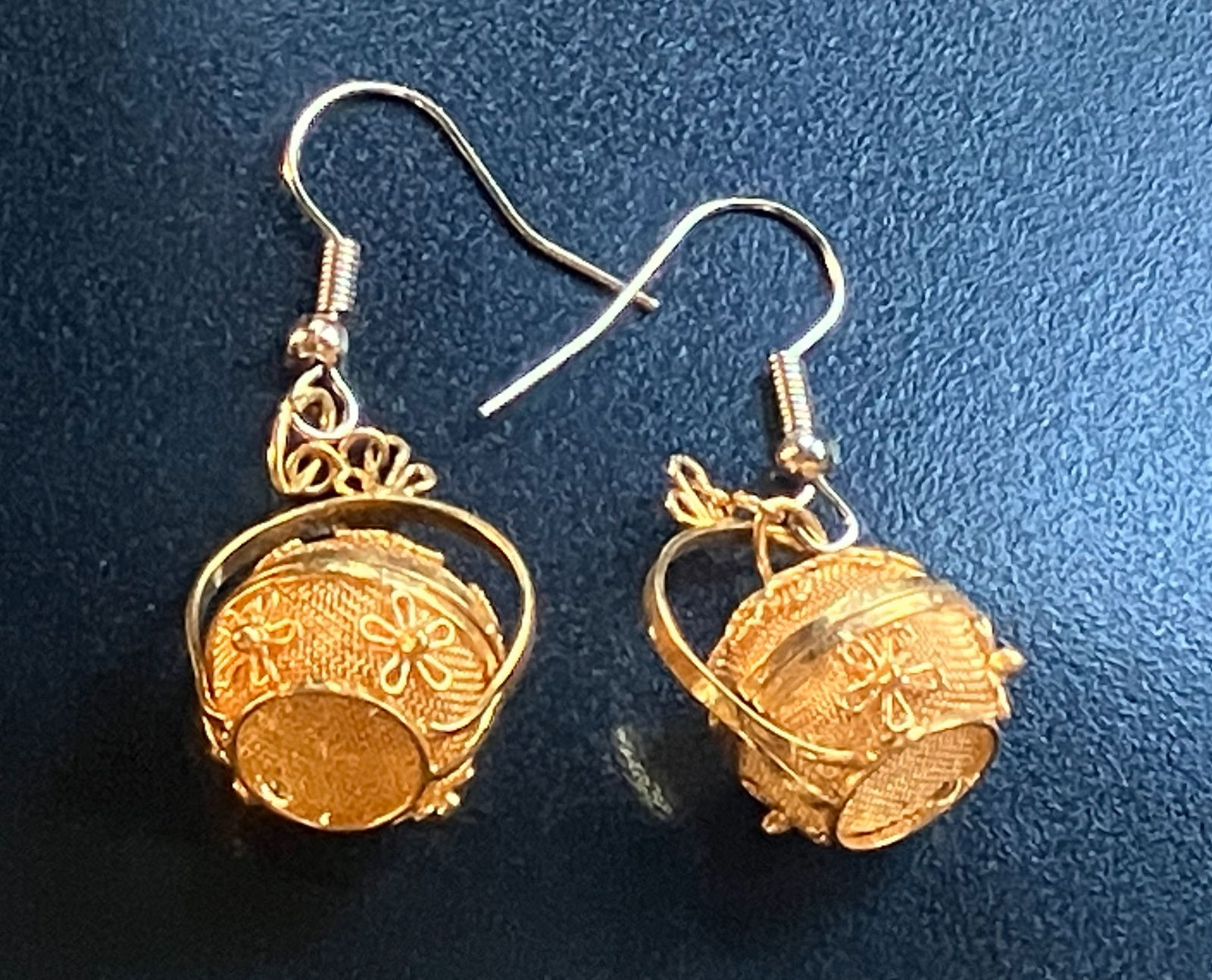Gold Filled Earrings: Elegant gold filled earrings with intricate floral design.