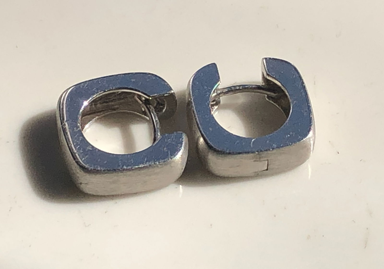 Pair of Silver Earrings: Pair of Silver Earrings