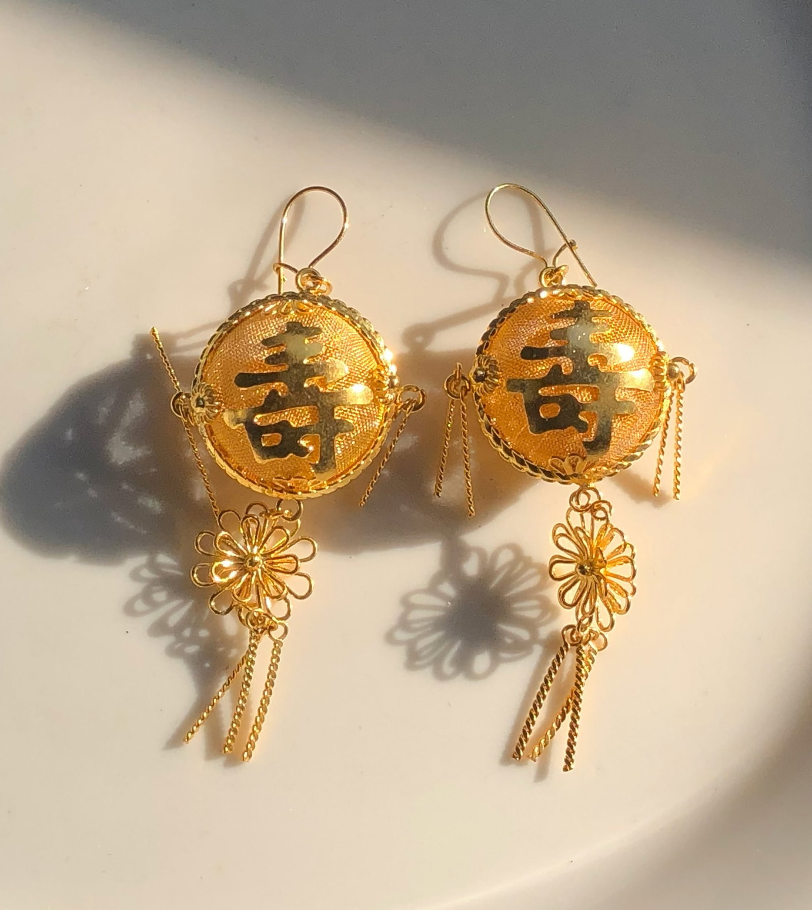 Gold Filled Chinese Character Earrings: Elegant gold Filled earrings featuring intricate Chinese character designs.