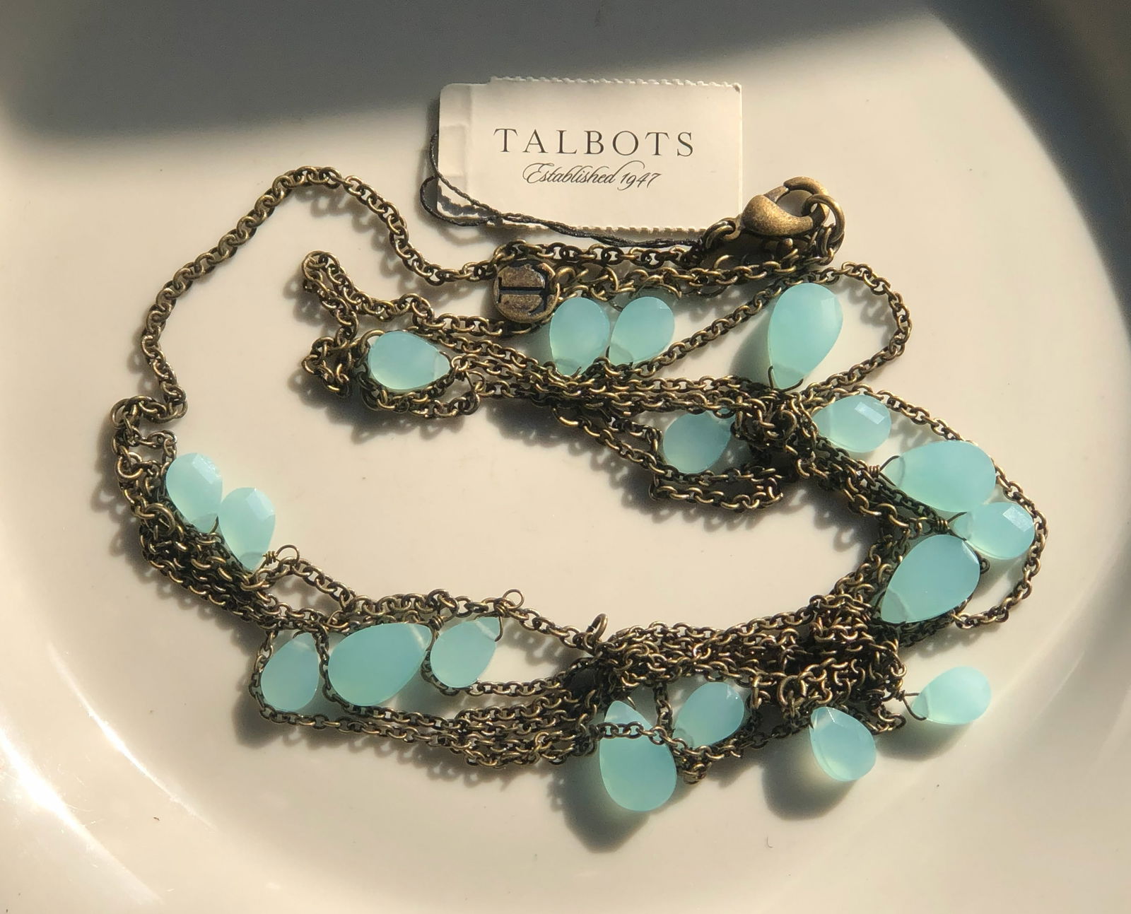 Talbots Necklace: Elegant necklace with blue stones and gold chain.