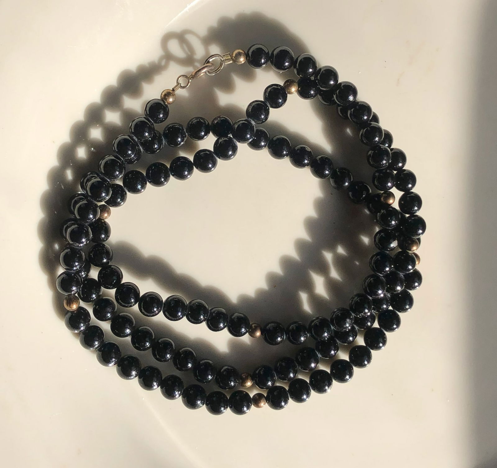 Black Bead Necklace with Silver Clasp: Elegant black bead necklace with a classic design with Silver Clasp.
