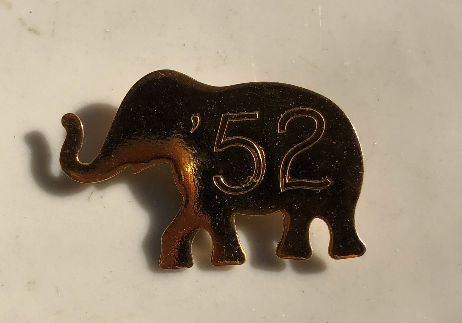 Elephant Pin '52: A vintage elephant-shaped pin with '52 engraved. Size: 2".