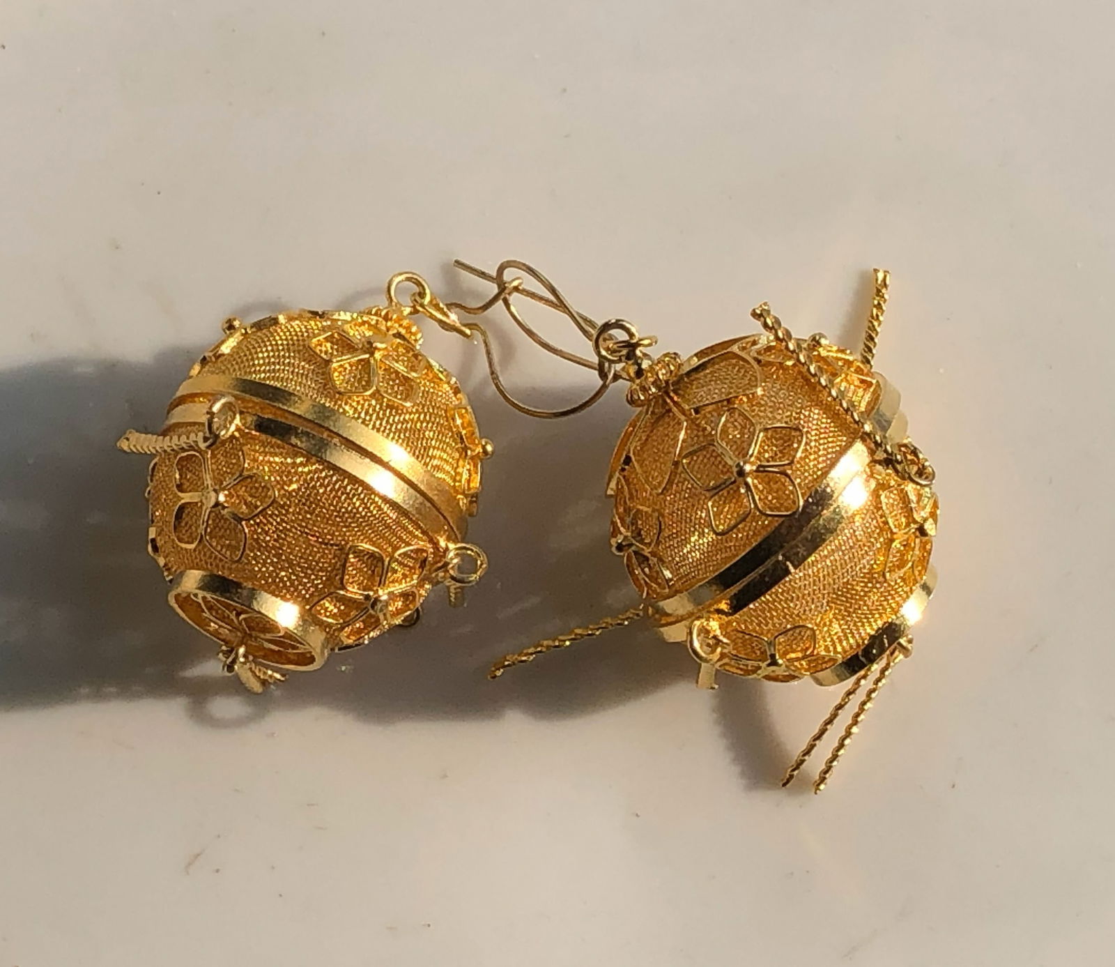 Gold filled Filigree Earrings: Elegant gold filled filigree earrings with intricate floral designs.