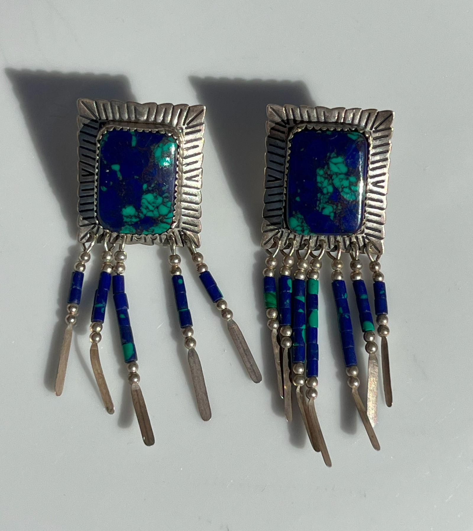 Stone Silver Earrings: Handcrafted stone and silver earrings with intricate detailing and dangling beads. Weight 12.1g.