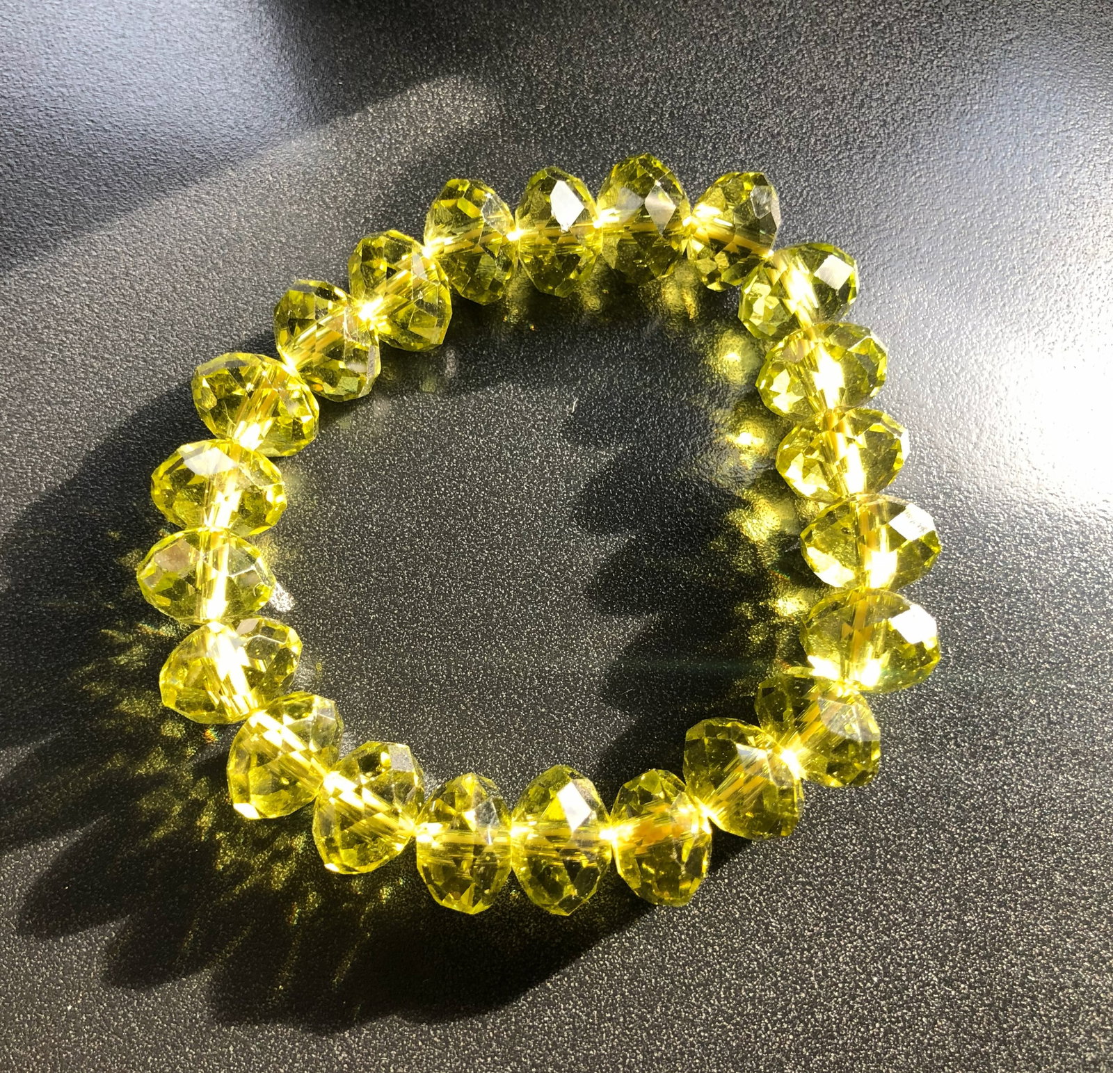 Yellow Crystal Bracelet: A stunning yellow crystal bracelet that sparkles in the light.