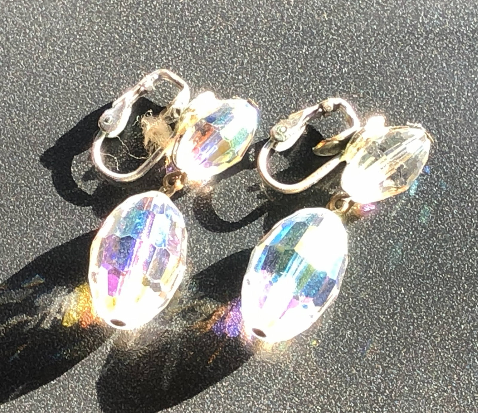 Crystal Earrings: Elegant crystal earrings with a shimmering finish.