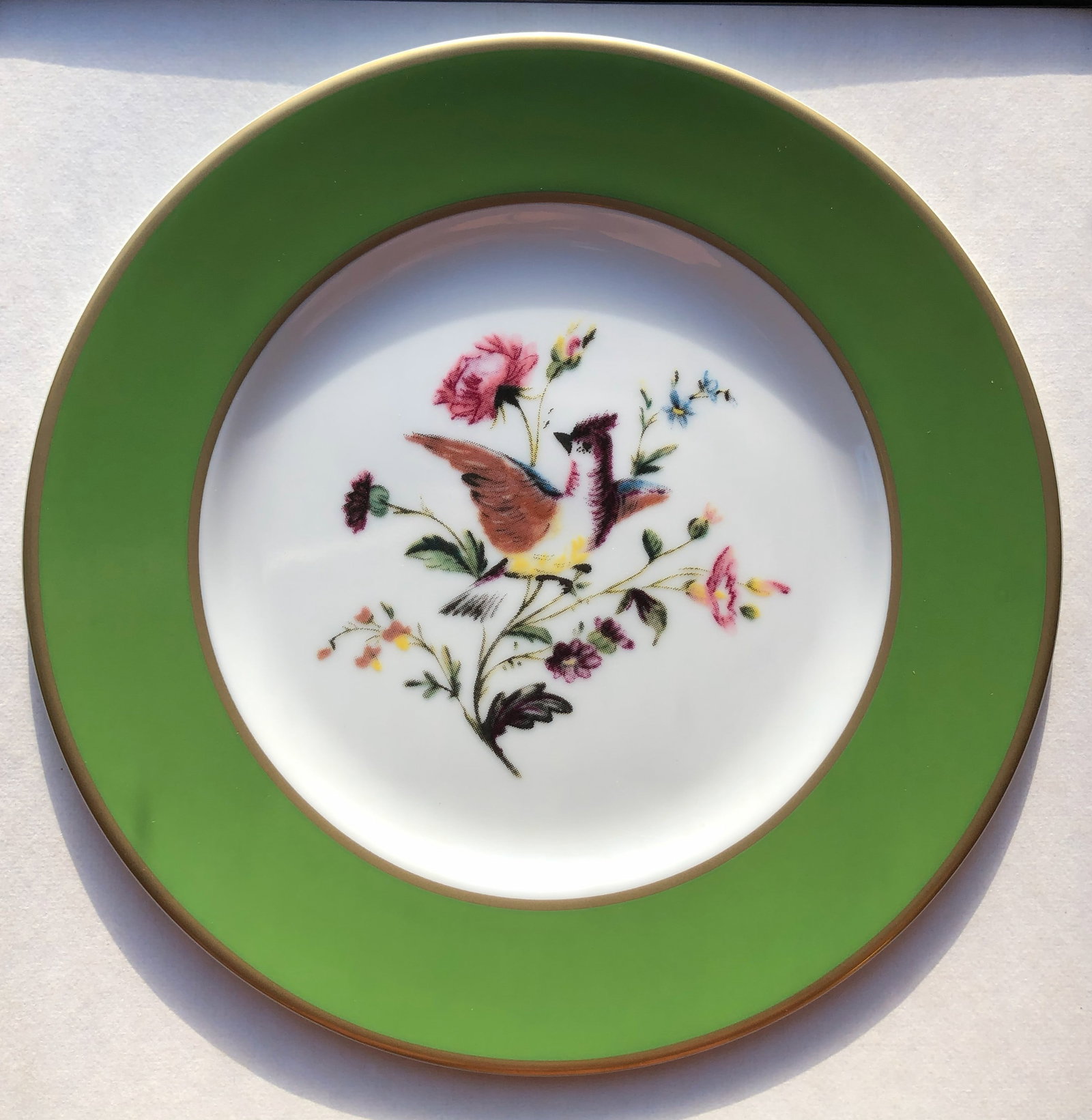 White house Desert Plate: A beautifully designed Whitehouse decorative plate with floral patterns and gold accents.