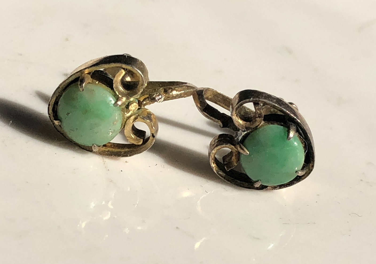 Pair of Green Jadeite Earrings Marked HK: Pair of Green Jadeite Earrings Marked HK