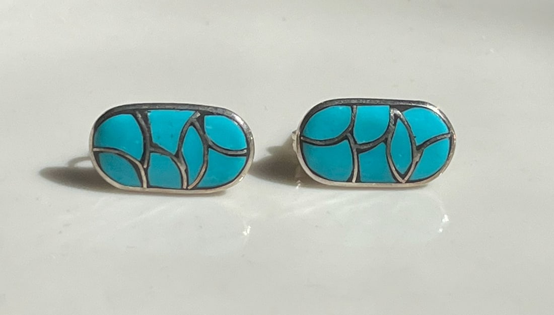 Pair of Silver Earrings: Pair of Silver Earrings