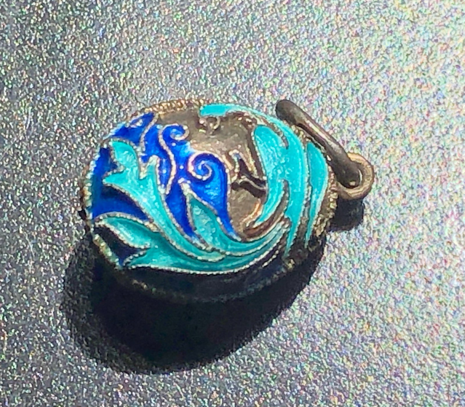 A beautifully crafted blue enamel silver pendant with intricate design: A beautifully crafted blue enamel silver pendant with intricate design