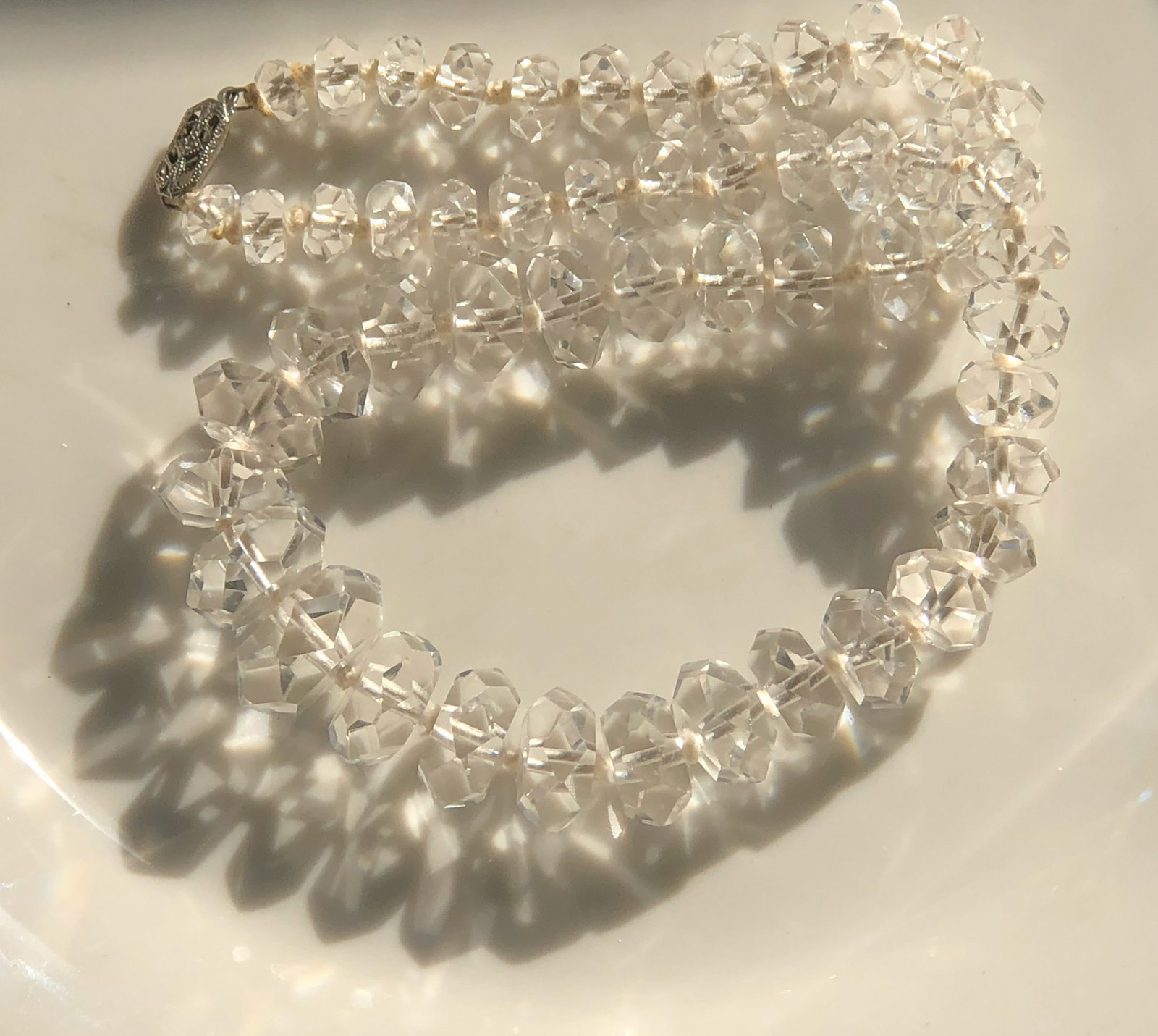 Crystal Necklace: Elegant crystal necklace with a beautiful clasp.