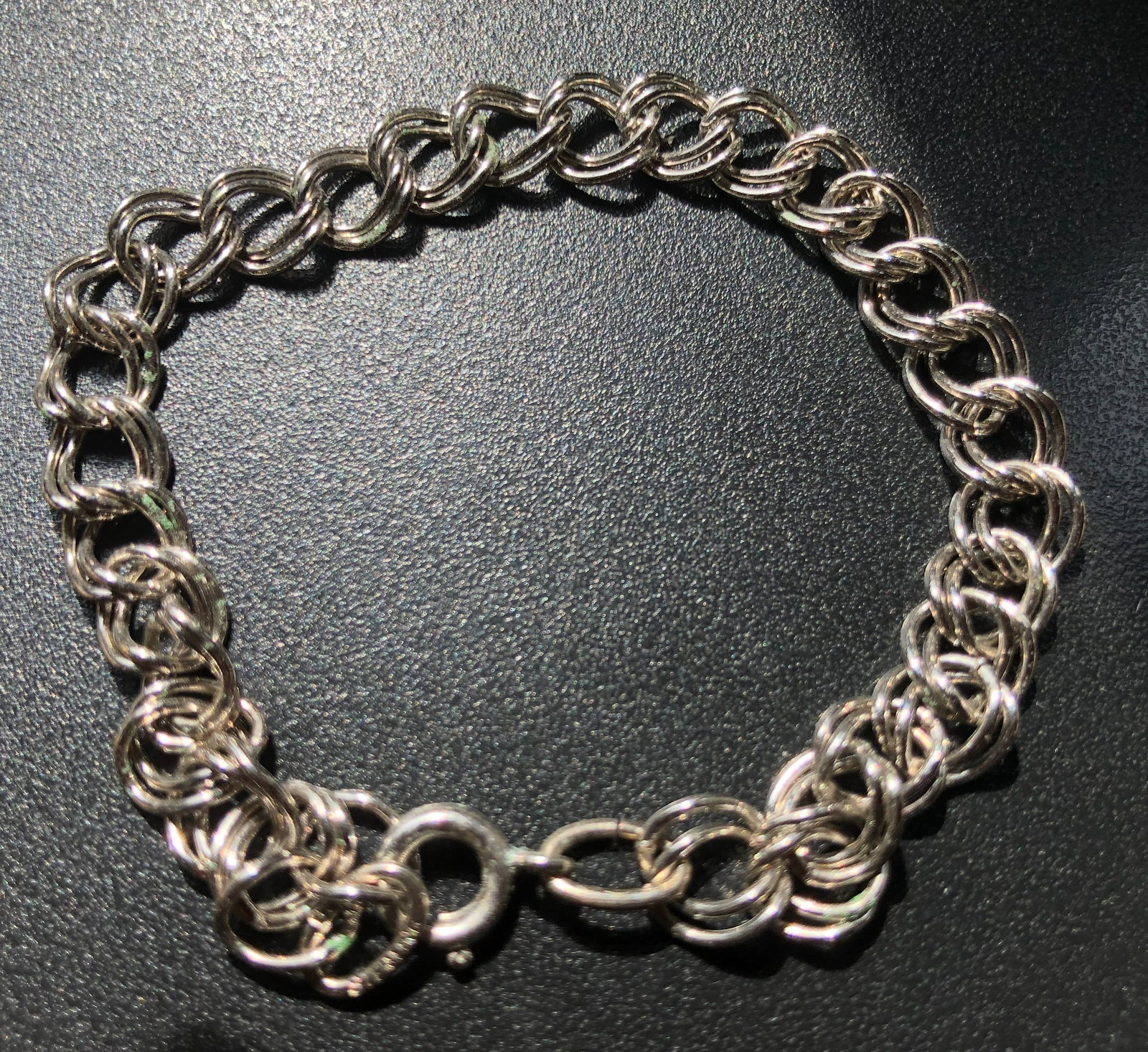 Silver Chain Bracelet: Elegant silver chain bracelet with a classic design.