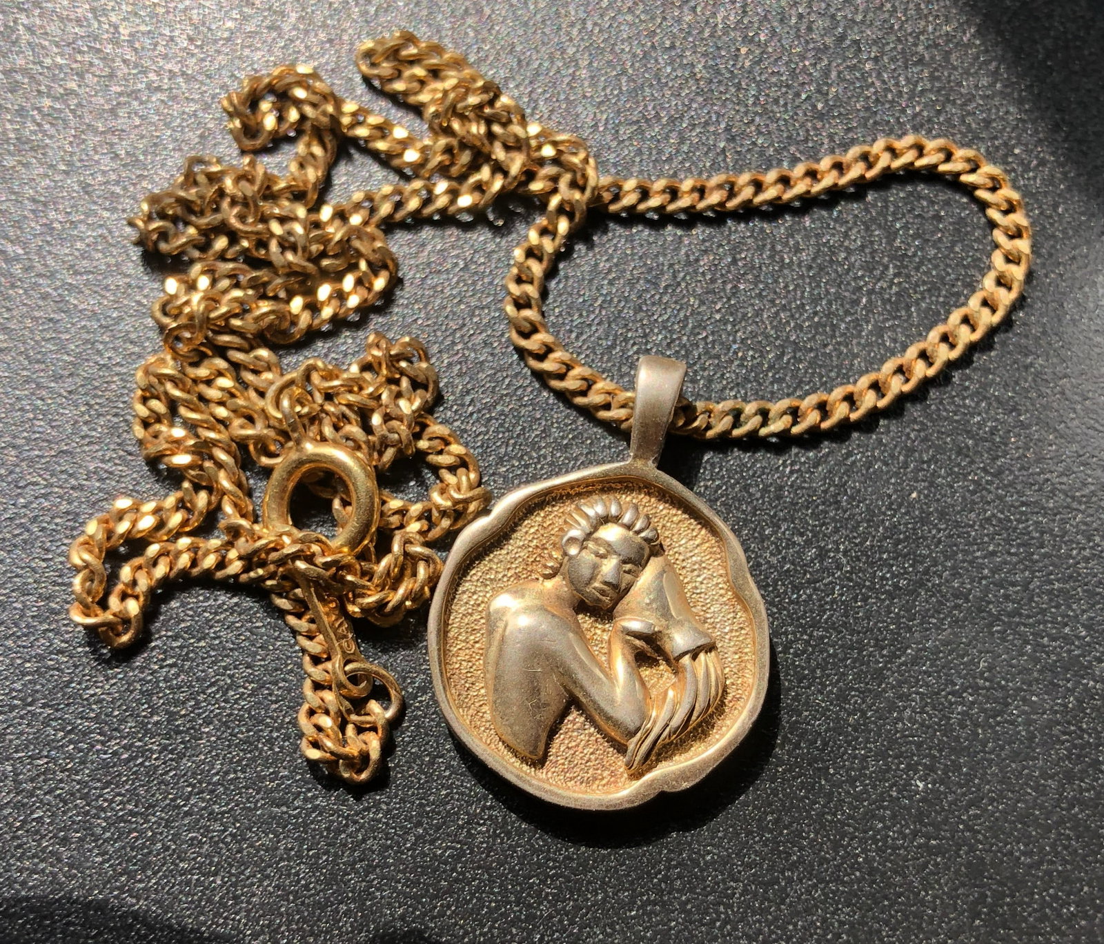 Gold filled Pendant Necklace: A beautifully crafted gold filled pendant necklace featuring an artistic design.