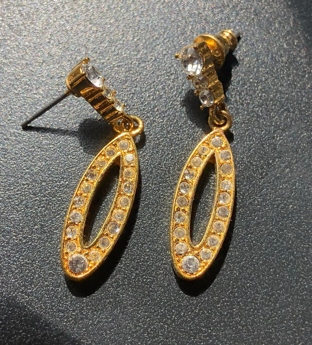 Gold fill and Crystal Earrings: Elegant gold fill earrings adorned with sparkling crystals.