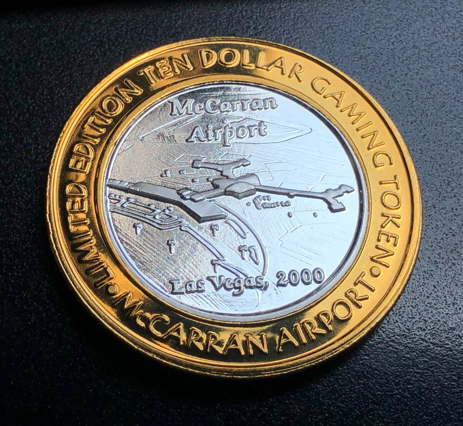 Silver token (1 of 2)