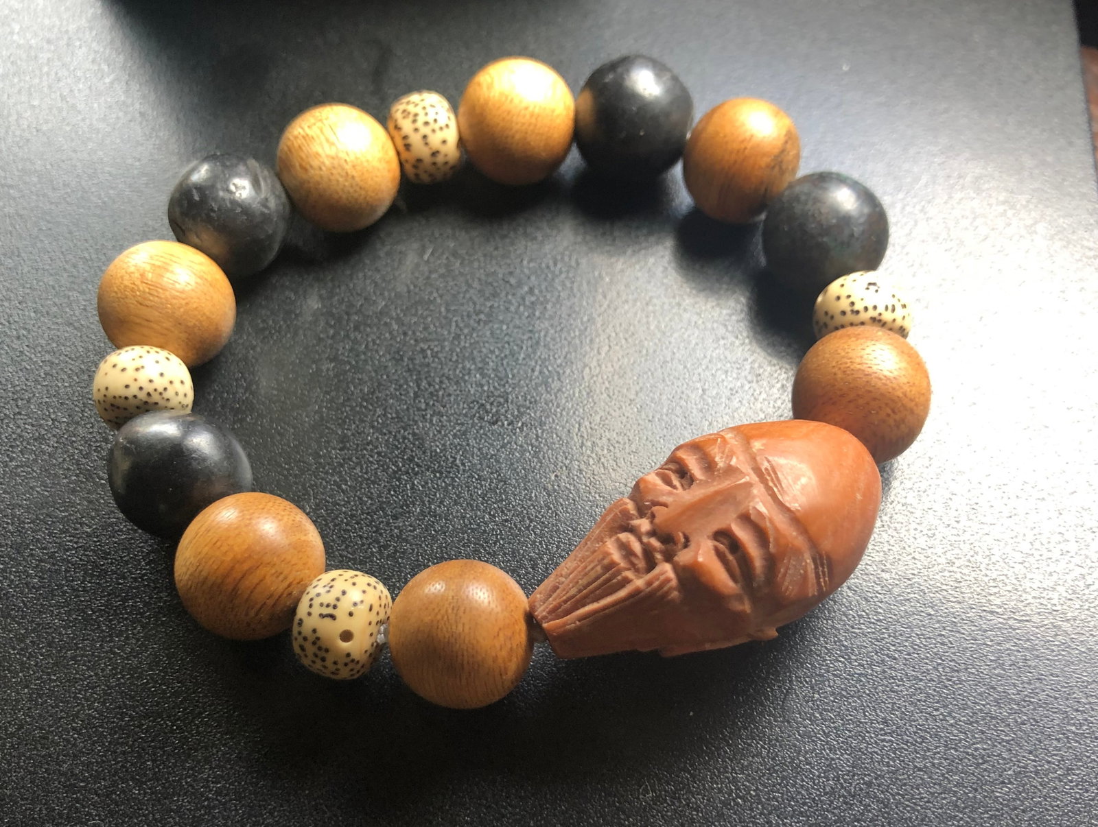 round multi colored Chen Xiang beads with face bead bracelet (1 of 2)