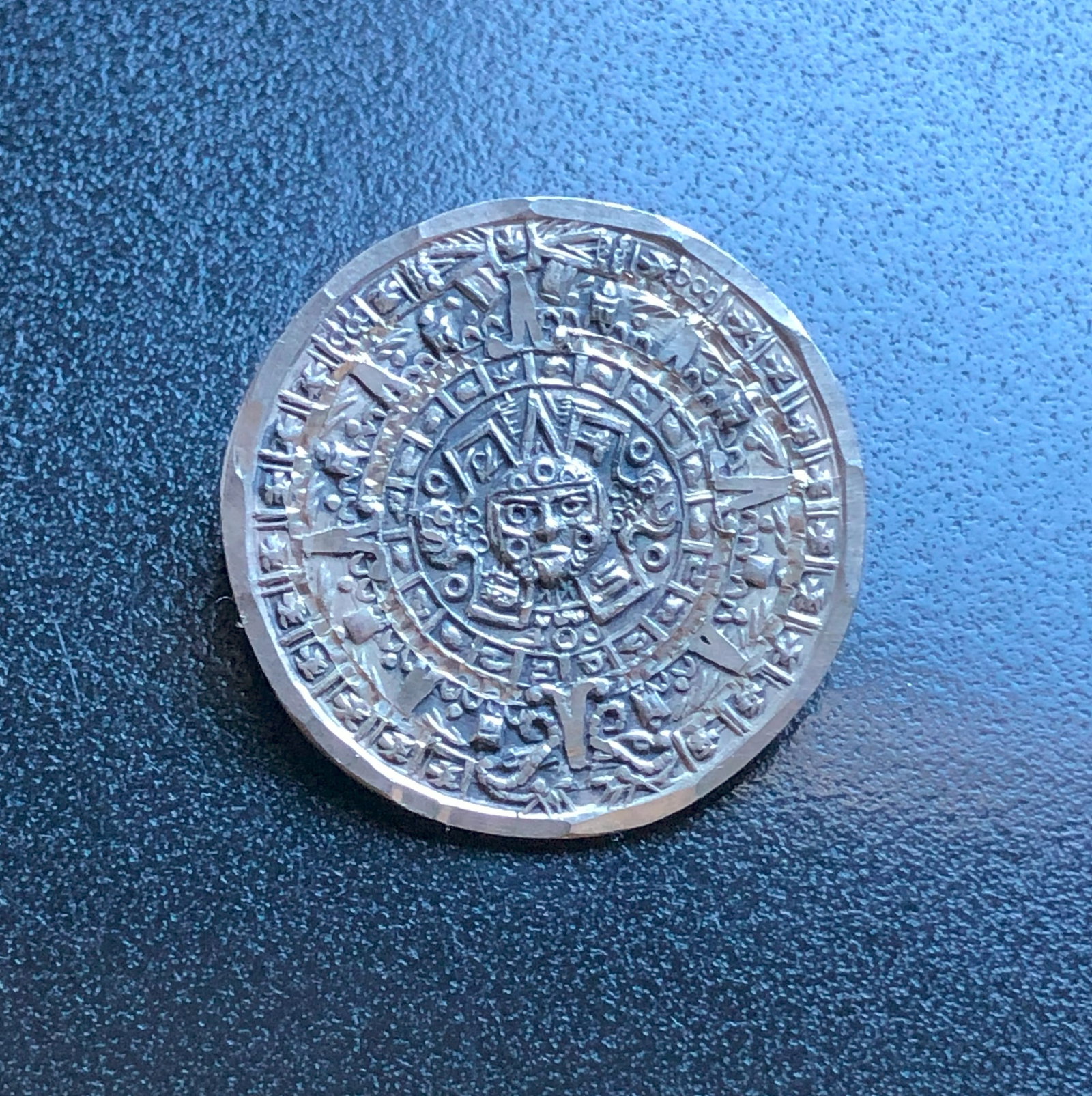 Aztec Calendar Silver Coin Brooch Pin: A detailed Aztec calendar Silver coin Brooch Pin, perfect for collectors.