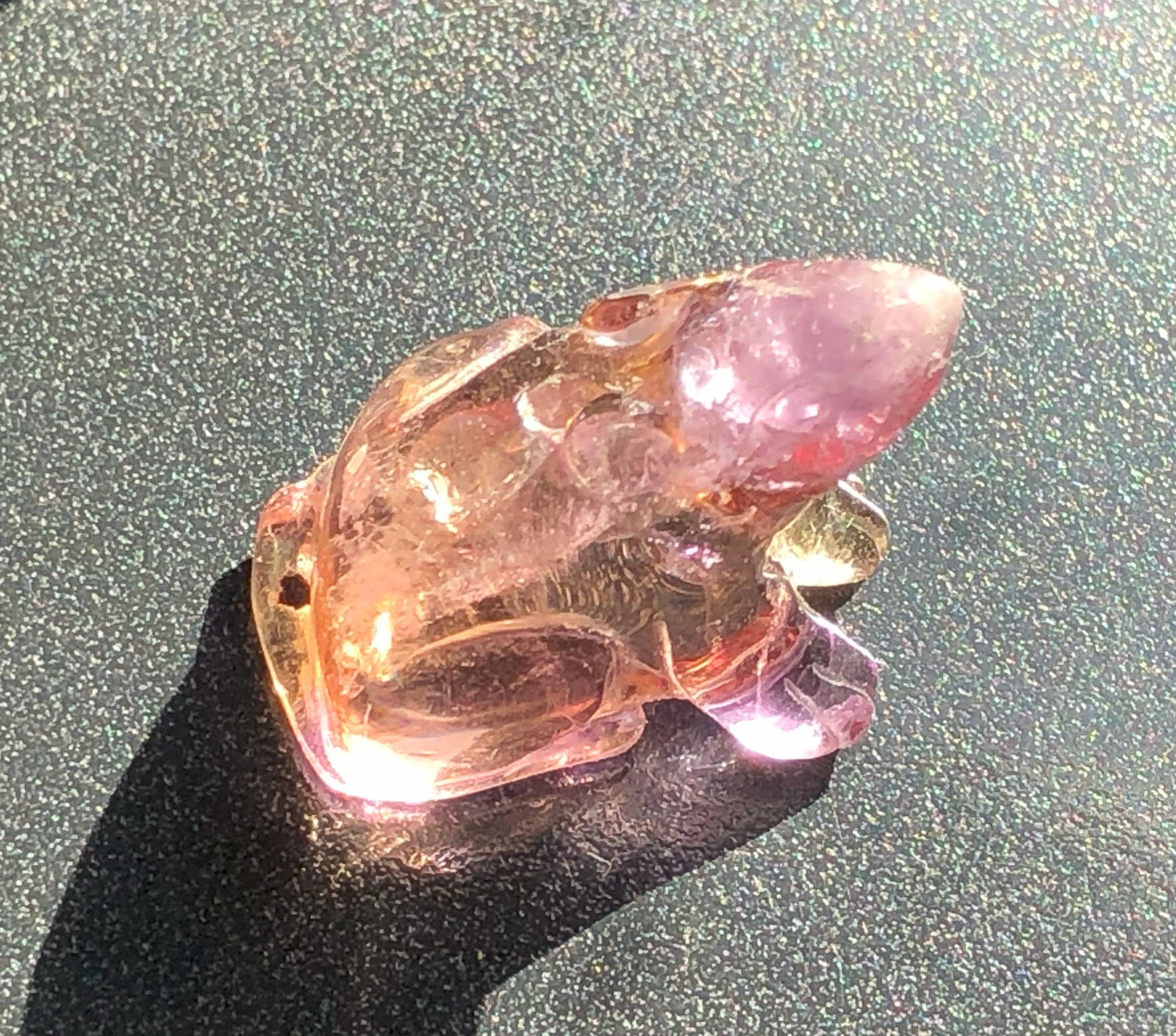 Crystal Carving of a Rat: A beautifully crafted crystal carving with intricate details.