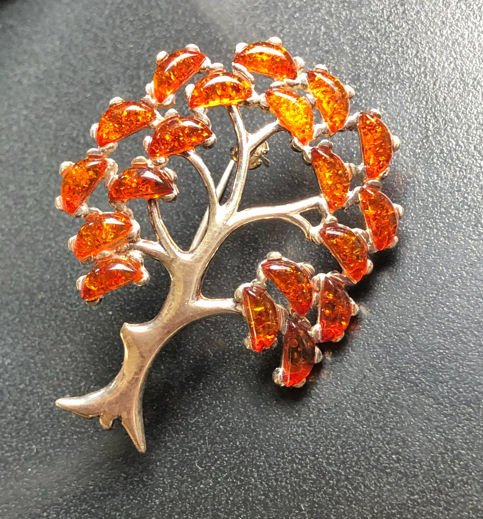 Amber Tree Silver Brooch: A beautiful silver brooch featuring a tree design with amber stones. Size: 2"