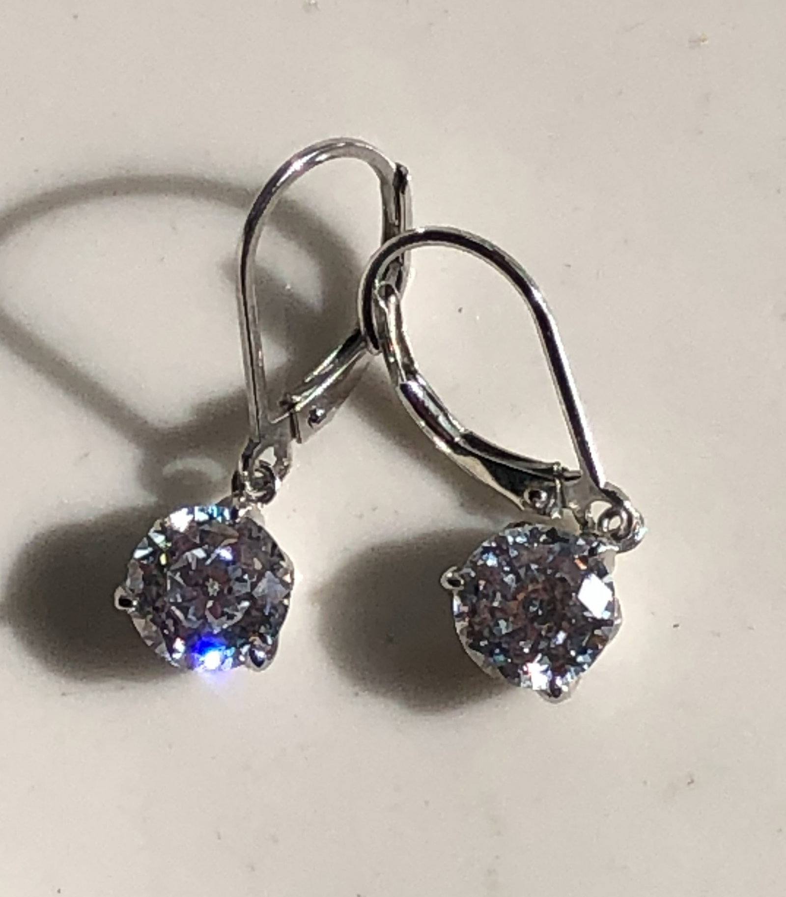 Silver Crystal Earrings: Elegant silver earrings with sparkling crystals.