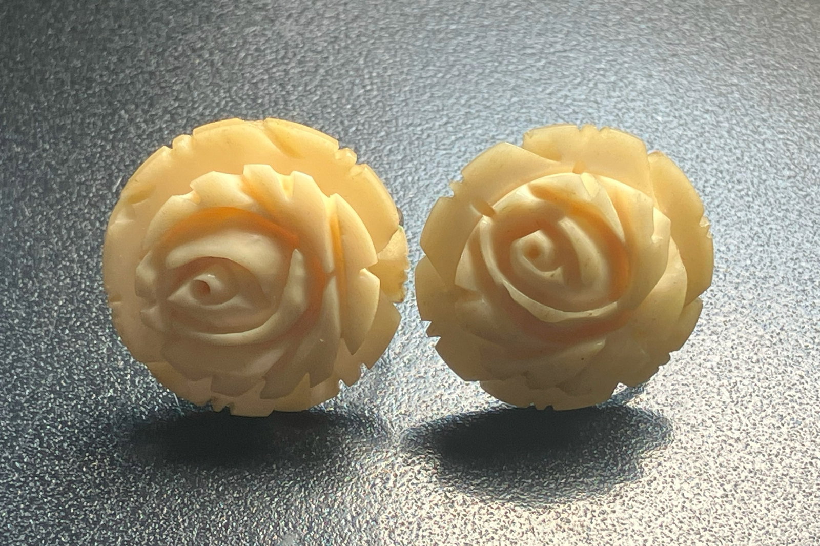 Pair of Carved Earrings: Pair of Carved Earrings