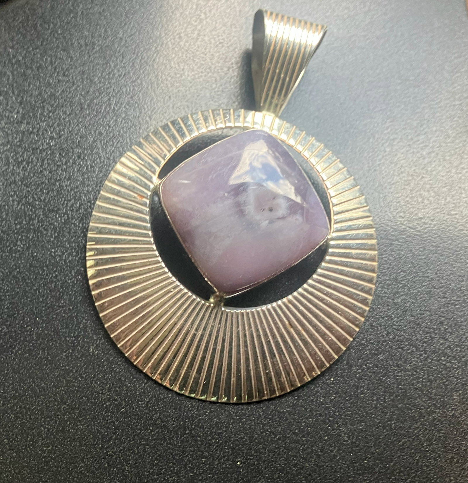 Silver Pendant with Purple Stone: Elegant Silver pendant featuring a central purple stone, Size including bale: 2.75", weight 21g