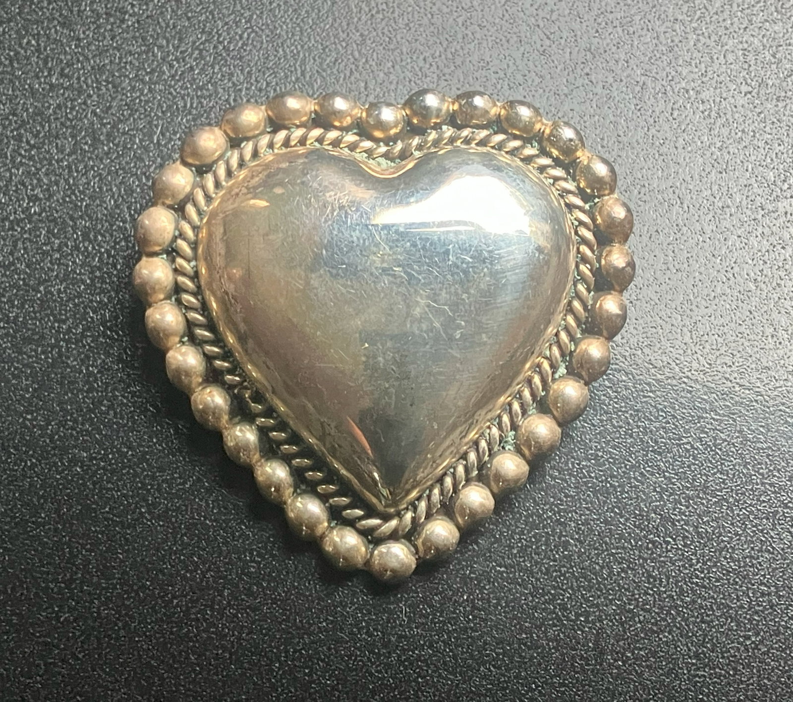 Silver Heart Brooch: A beautifully crafted silver heart brooch with intricate detailing, Size: 1.75" x 1.75", weight 20g