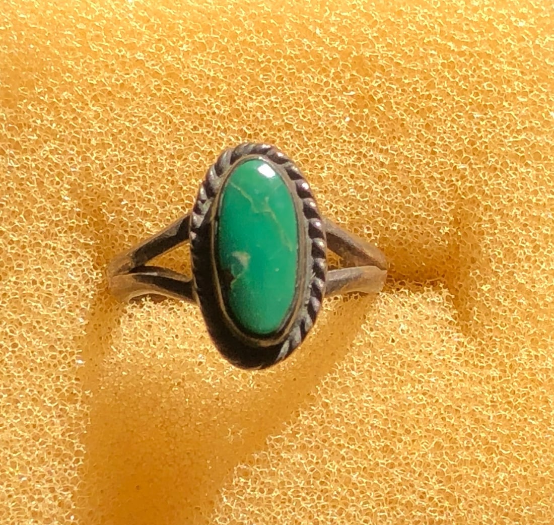 Turquoise Silver Ring: A beautiful turquoise stone set in a silver band. Size 3.
