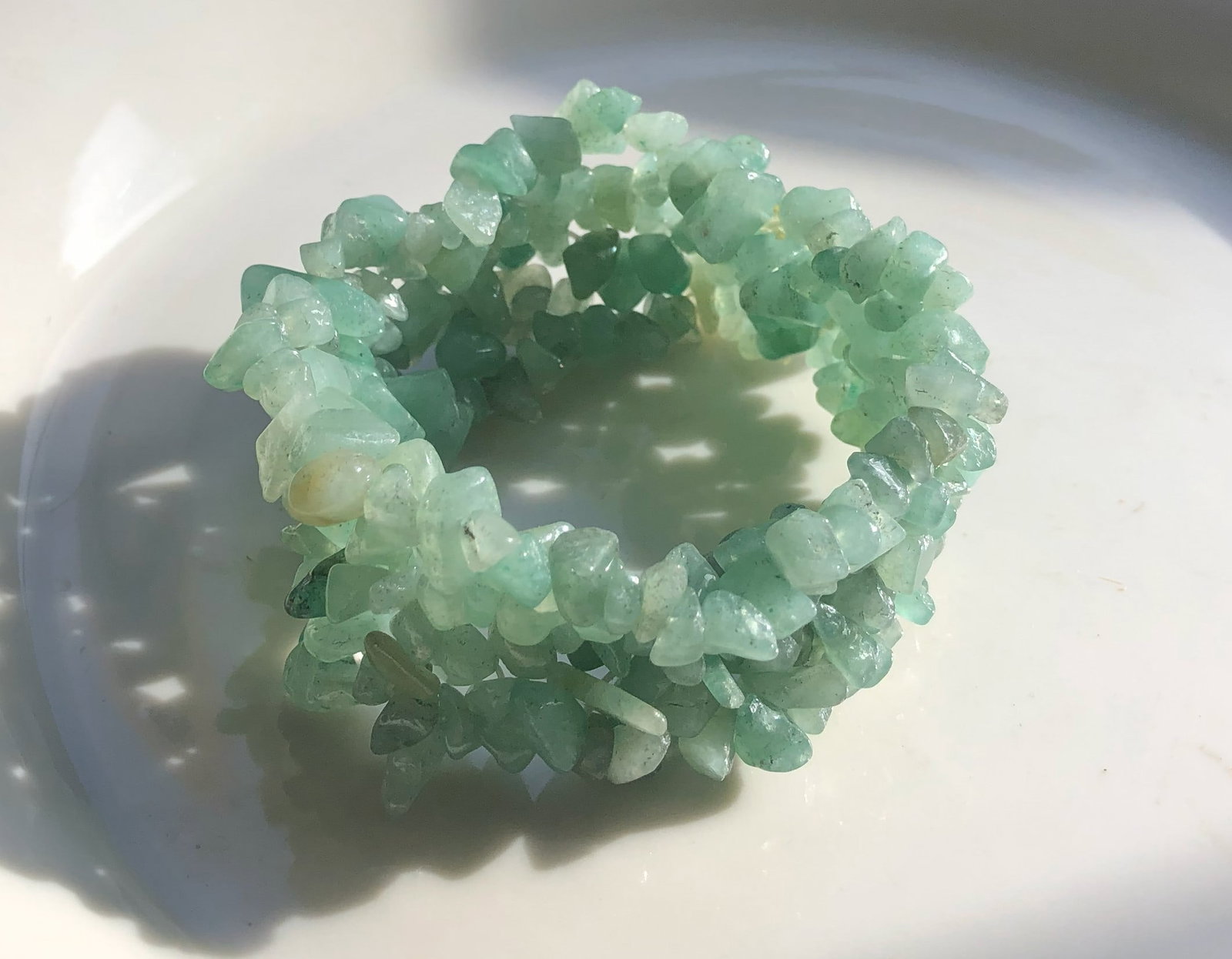 Green Stone Bracelet: A beautiful bracelet made of green stones, perfect for any occasion.