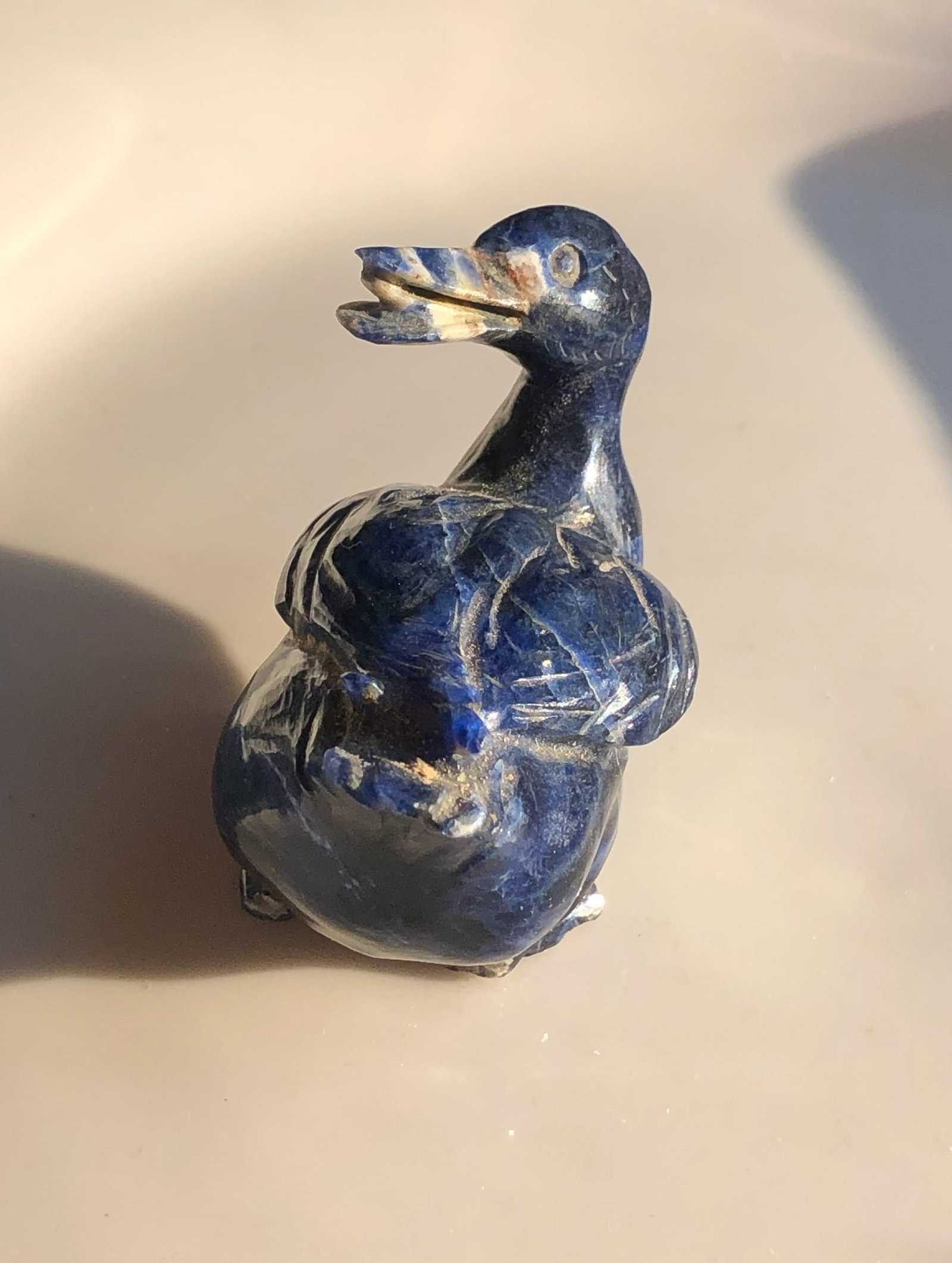 Lapis Lazuli Duck Figurine: A beautifully crafted Lapis Lazuli duck figurine, perfect for home decor or as a unique gift. Size: 2".