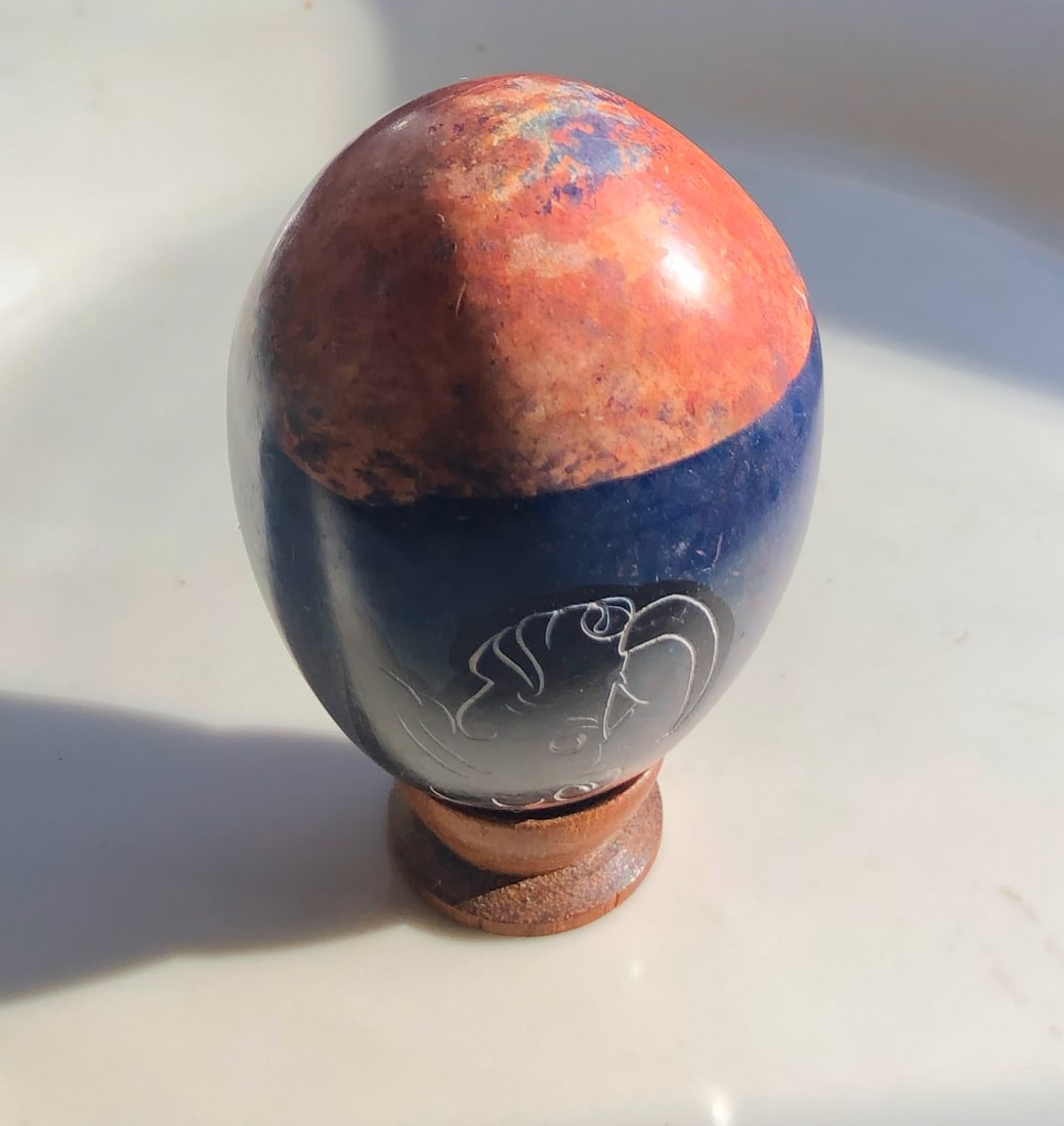 Decorative Stone Egg: A beautifully crafted decorative stone egg with intricate designs. Size: 3"