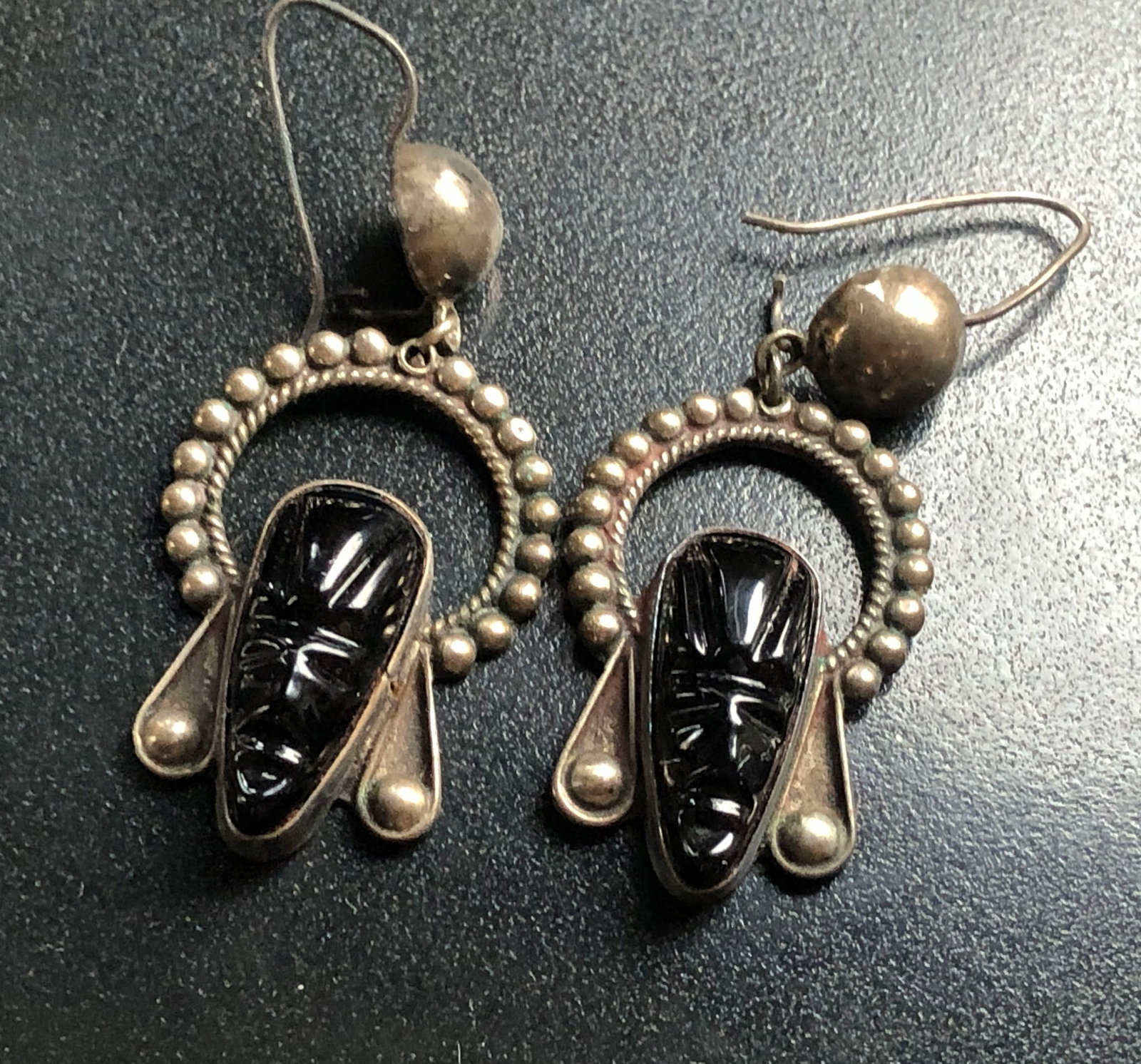 Vintage Silver Tribal Earrings: Handcrafted vintage Silver tribal earrings with intricate design.