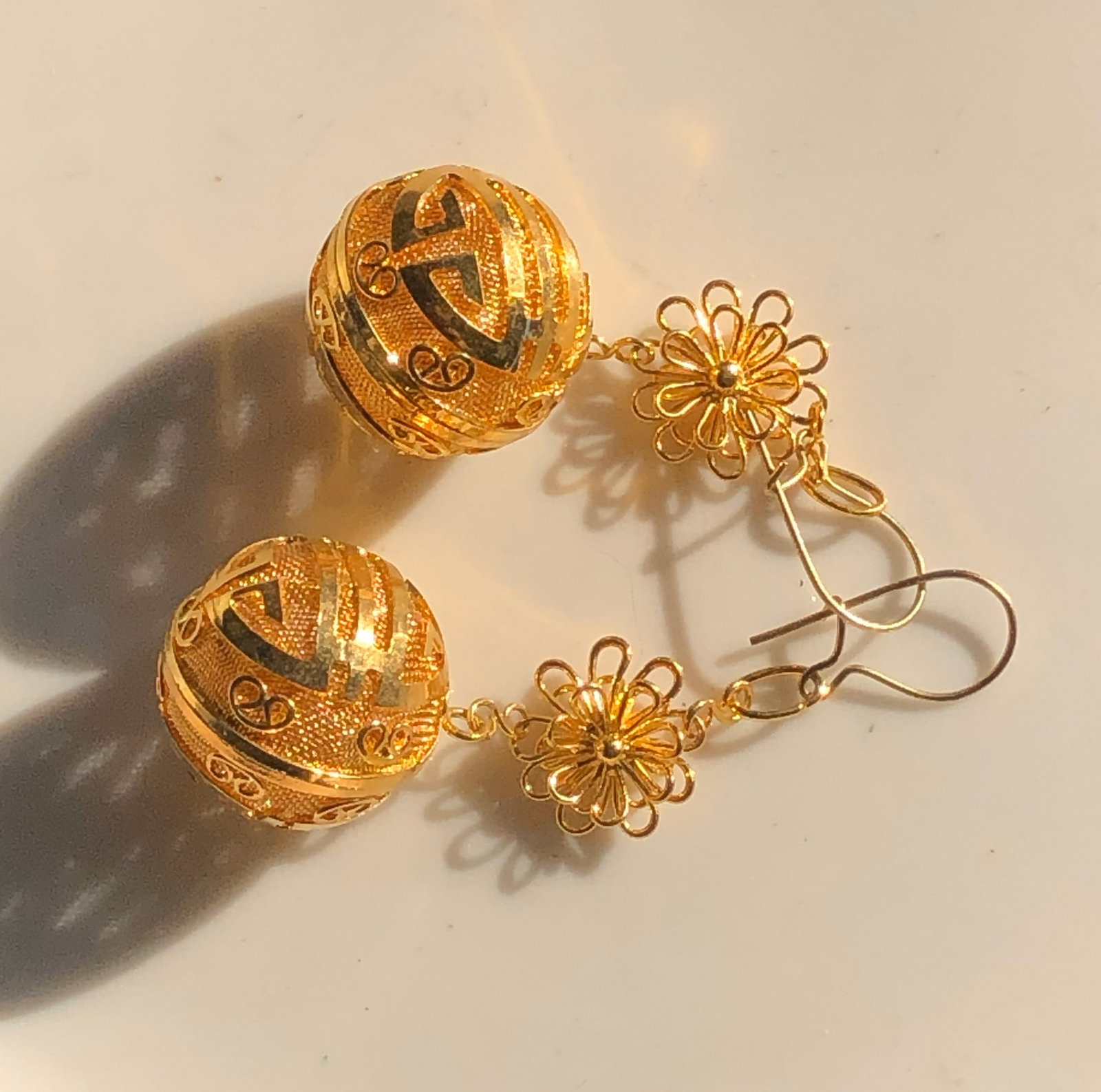 Gold Filled Filigree Earrings: Elegant gold filled filigree earrings with intricate design.