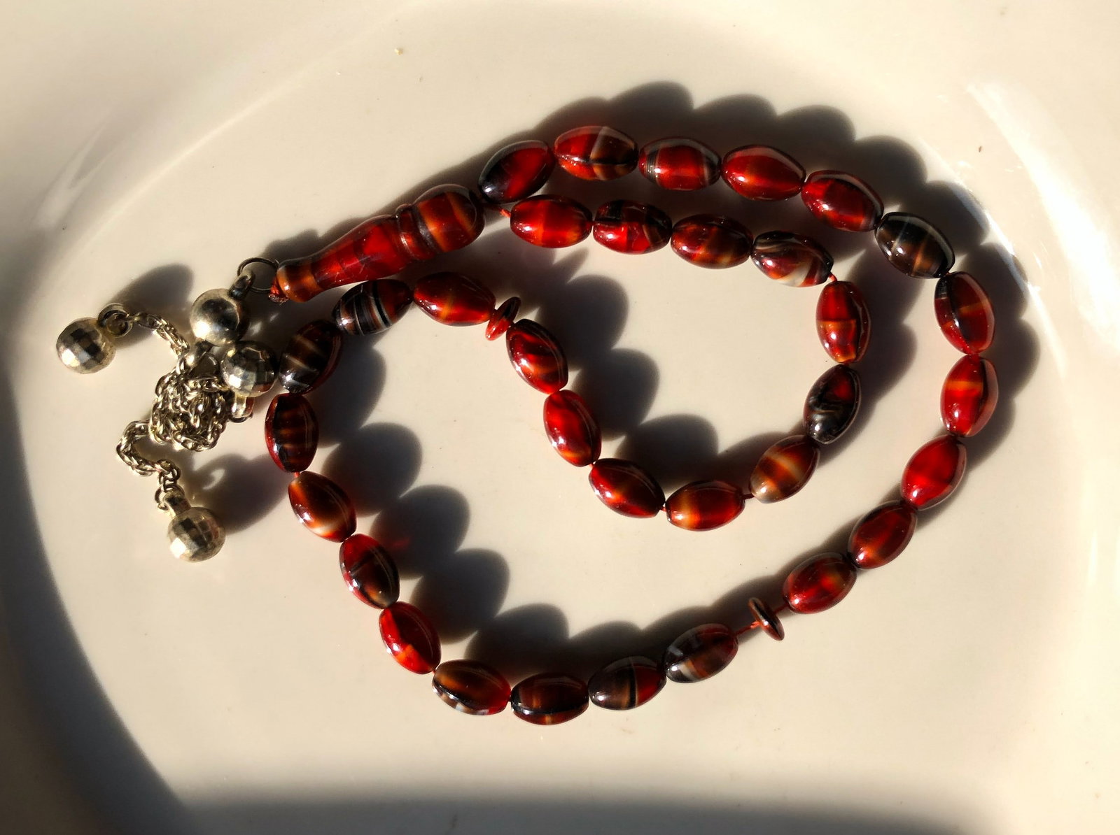 Red Beaded Necklace: A beautiful red beaded necklace