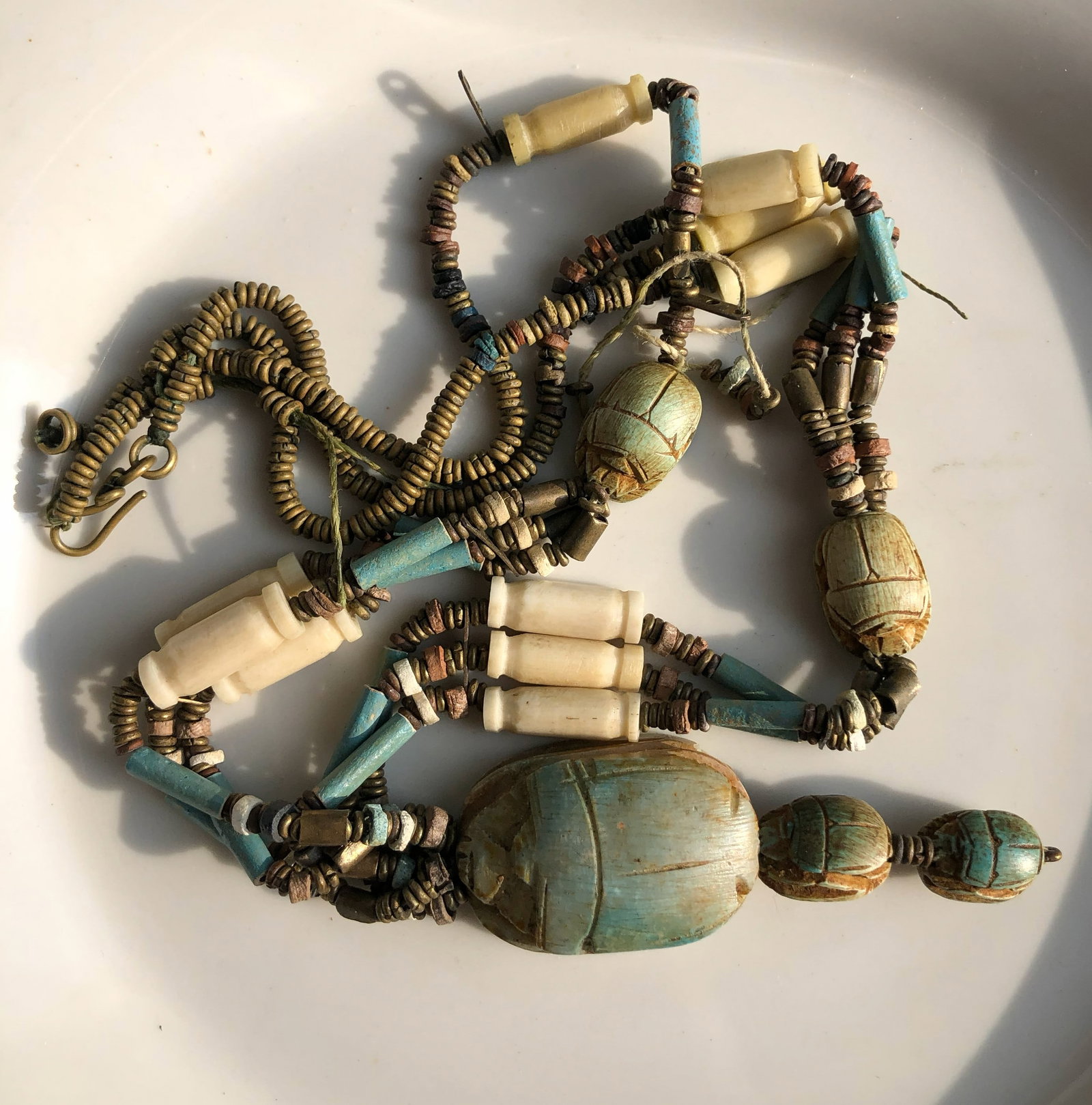 Vintage Beaded Necklace: A unique vintage beaded necklace with intricate designs and earthy tones.