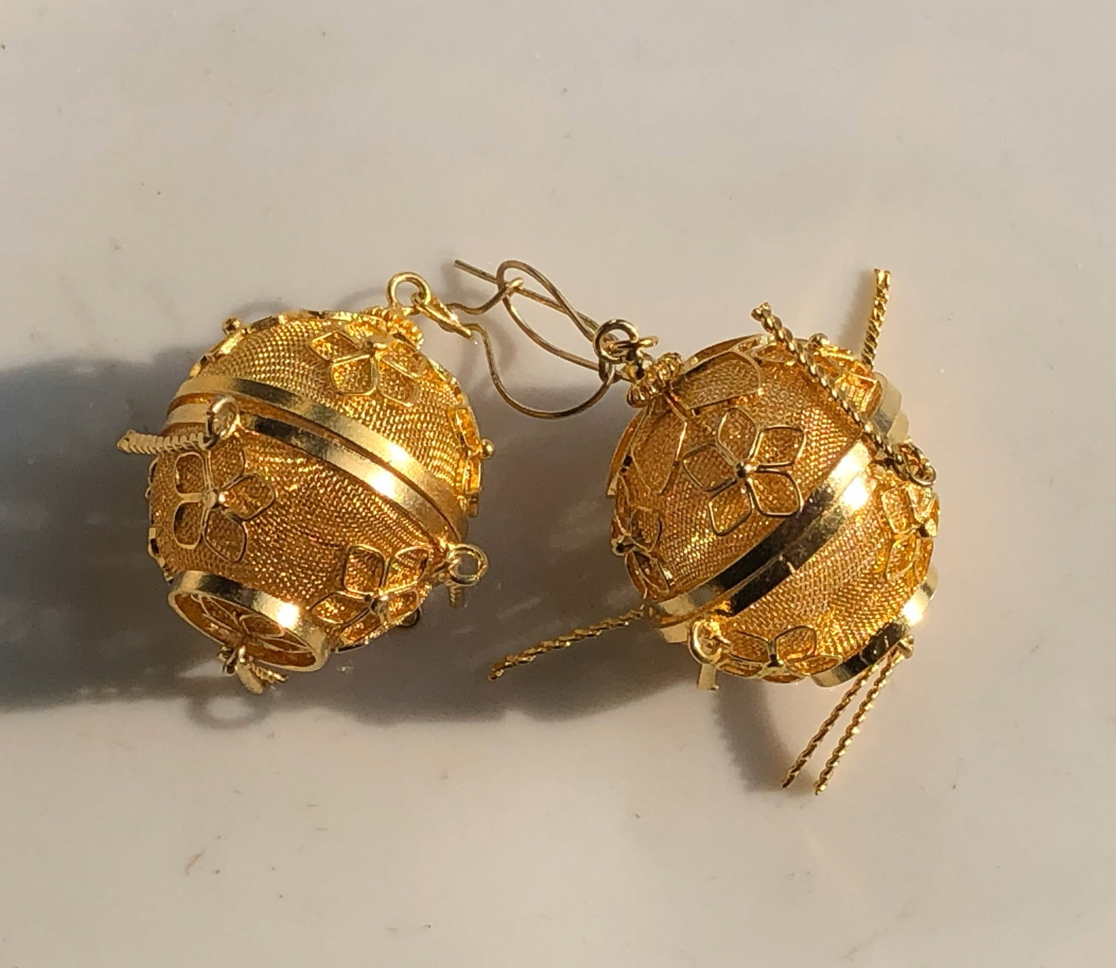 Gold filled Filigree Earrings: Elegant gold filled filigree earrings with intricate floral designs.