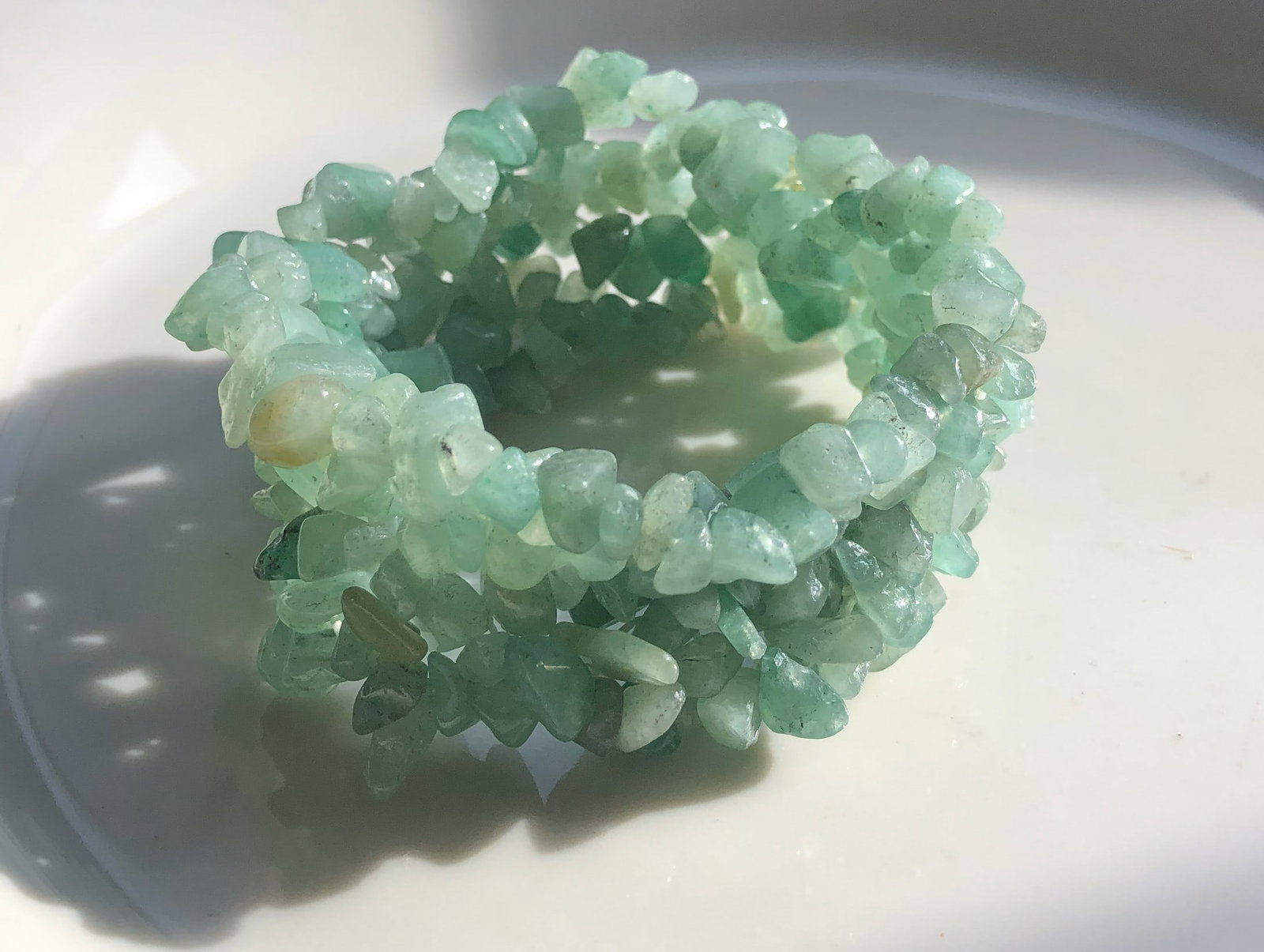 Green Stone Bracelet: A beautiful bracelet made of green stones.