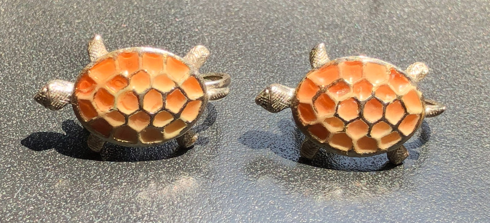 Beautiful turtle-shaped earrings with intricate shell design. (1 of 3)