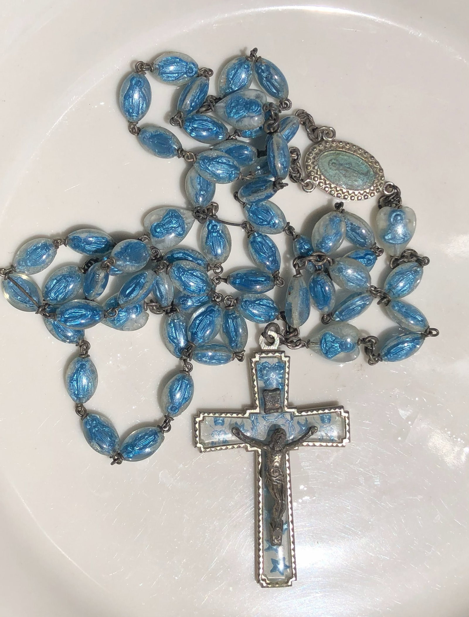 A beautiful set of blue rosary beads with a detailed crucifix (1 of 3)