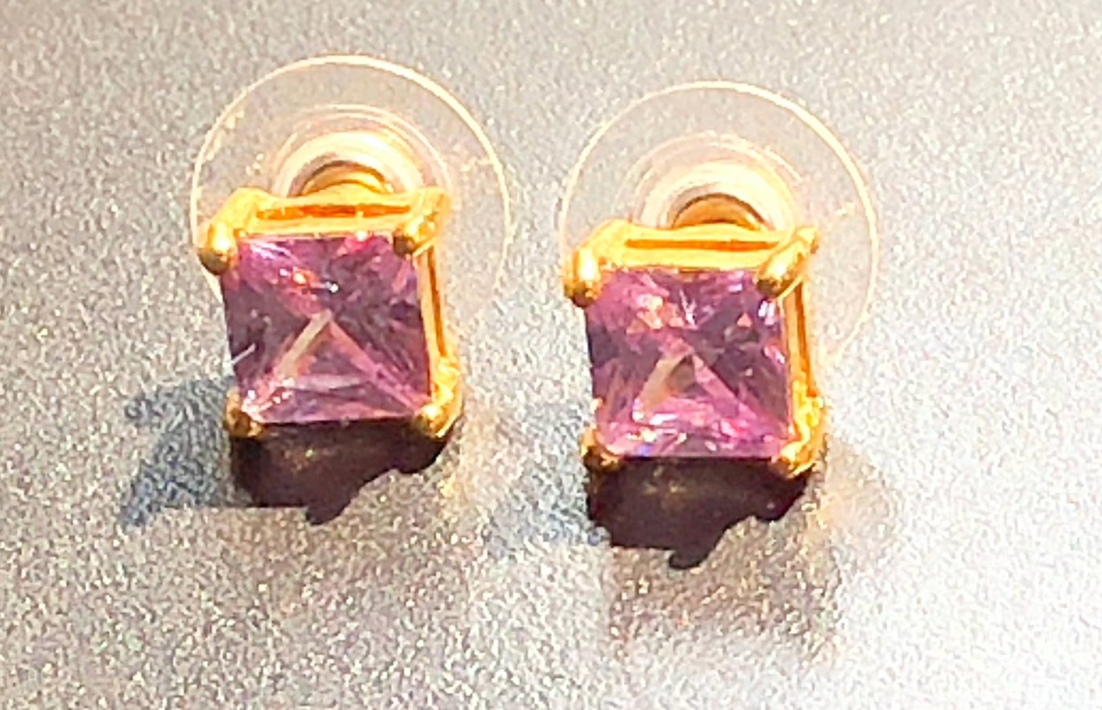 Elegant purple gemstone earrings set in a gold-tone frame (1 of 3)