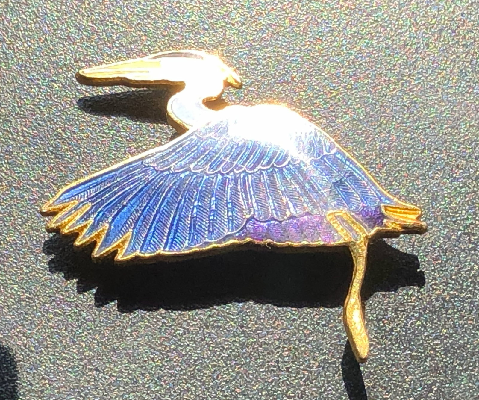A beautifully crafted blue heron pin with intricate detailing (1 of 3)
