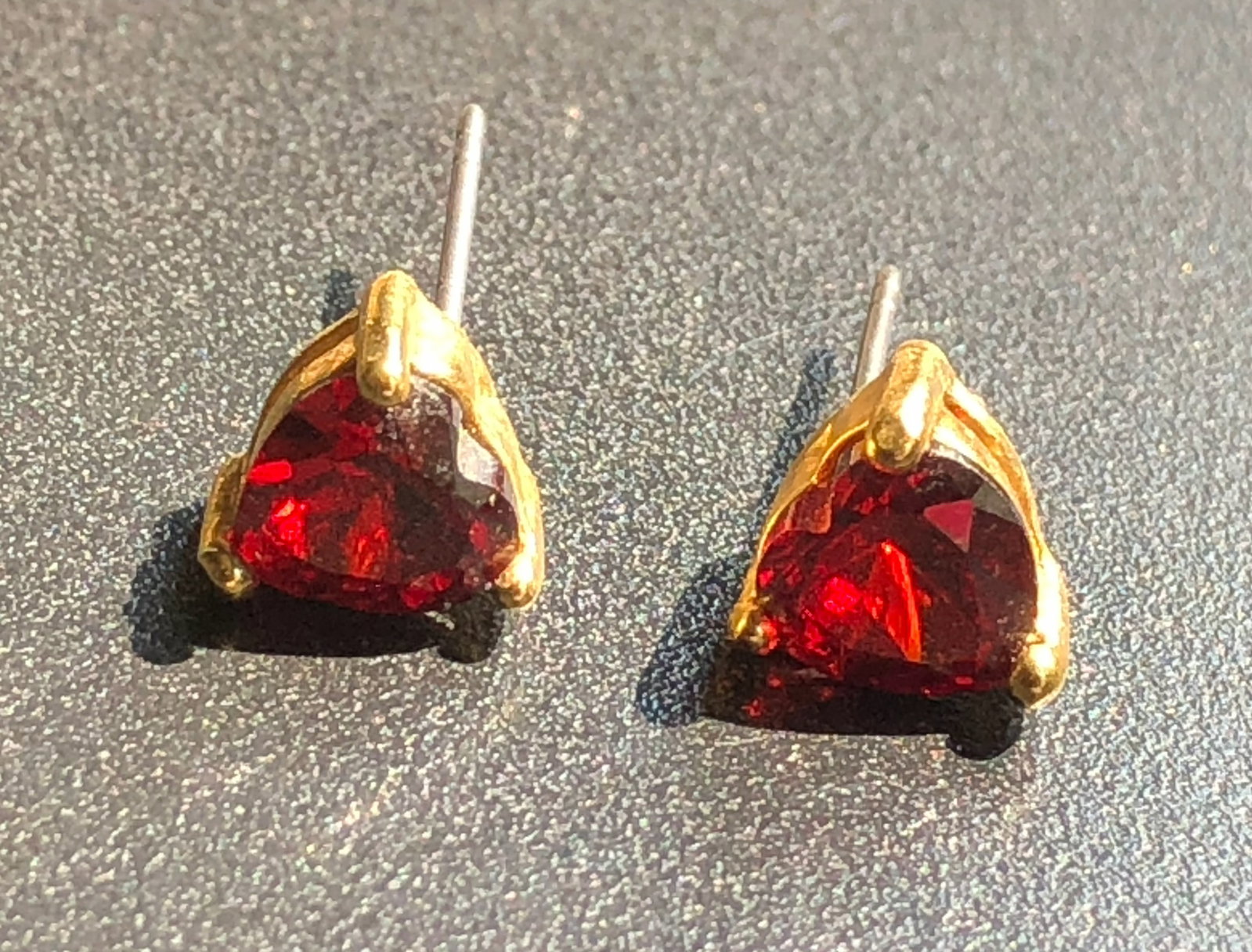 Elegant gold plated earrings featuring vibrant red gemstones (1 of 3)