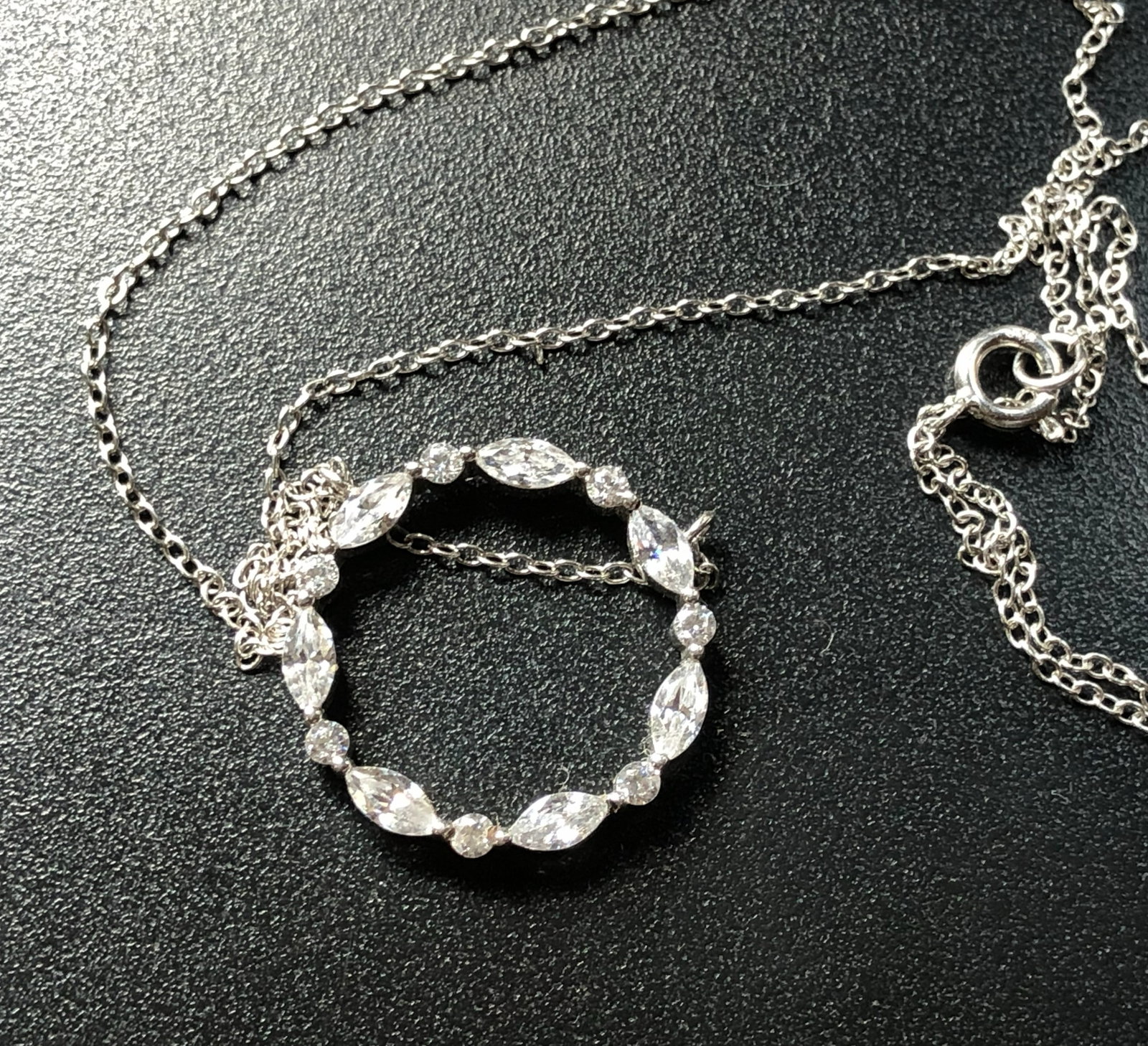 Elegant Silver Necklace: A beautiful silver necklace with sparkling stones, perfect for any occasion.