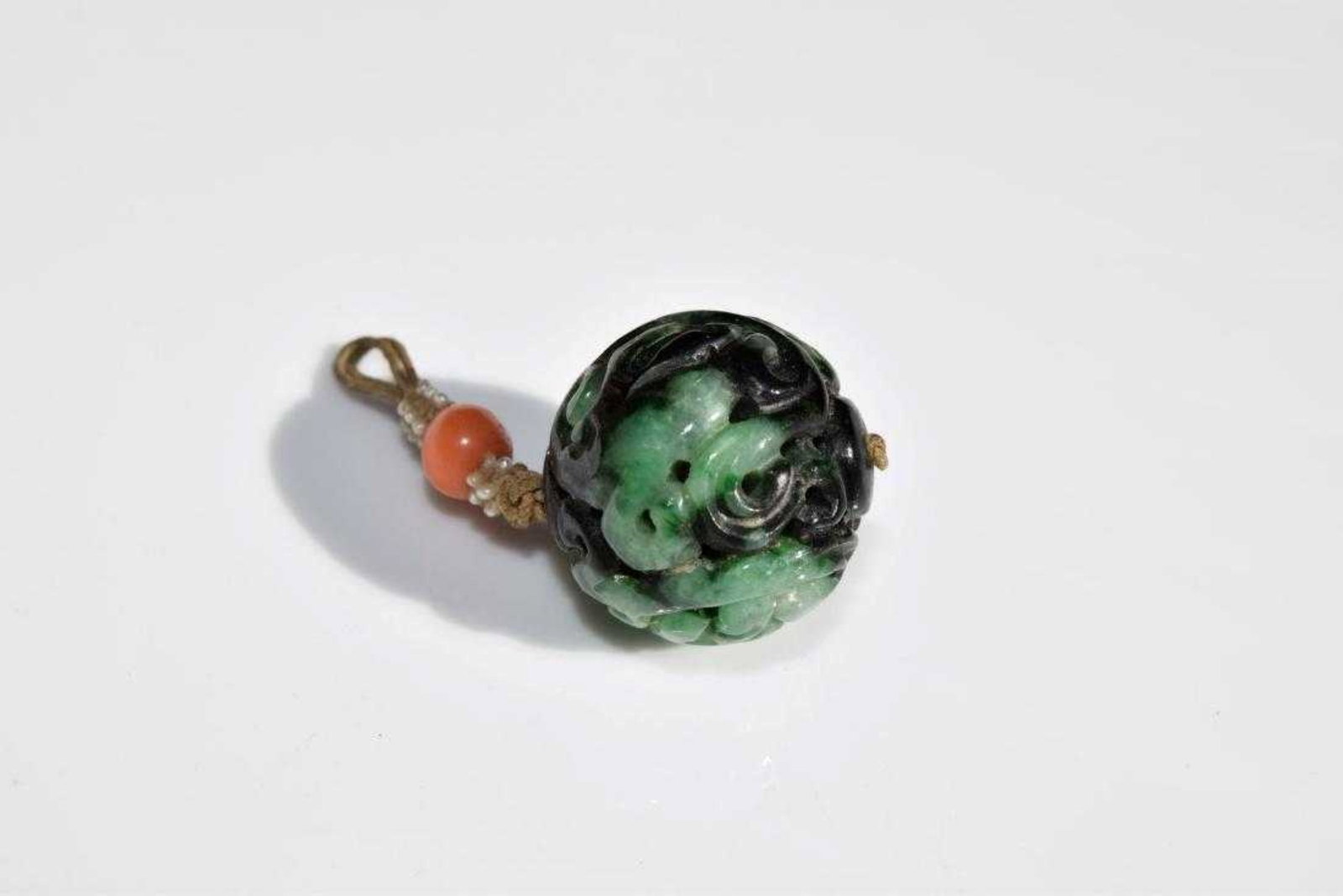 Antique Chinese Imperial Carved Jadeite Pendant, diameter 22mm.: Antique Chinese Imperial Carved Jadeite Pendant, diameter 22mm.