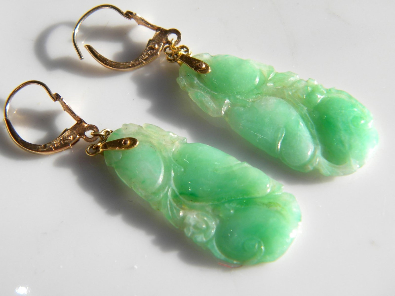 Pair of 14K Gold Jadeite Earrings: Pair of 14K Gold Jadeite Earrings