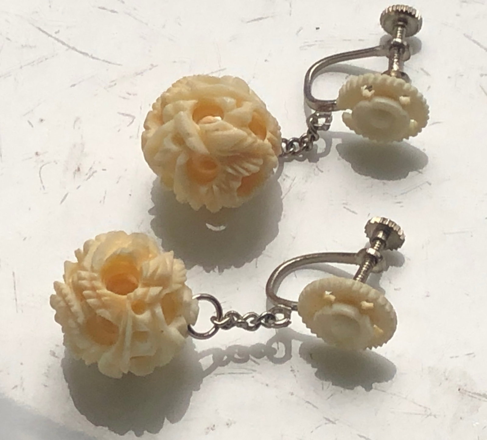 Pair of Carved Errings