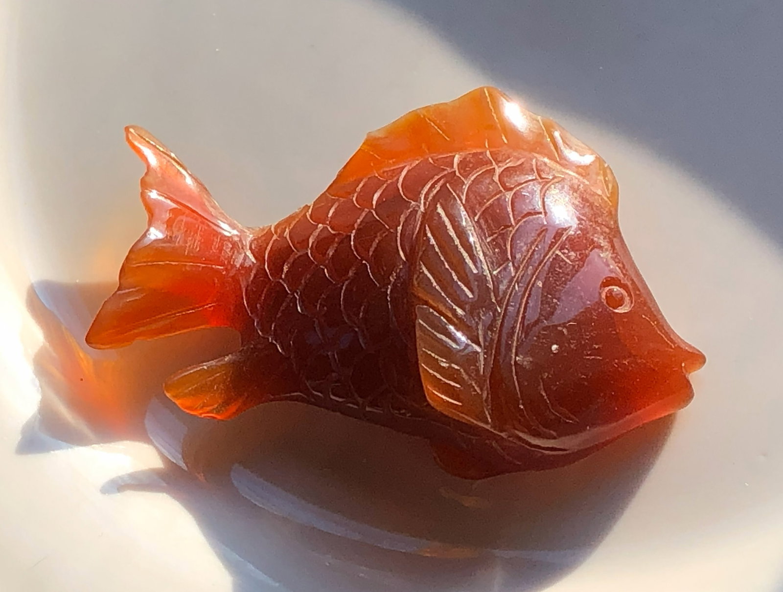 Carved Carnelian Fish: A beautifully carved Carnelian fish figurine, perfect for decoration, Size: 3".