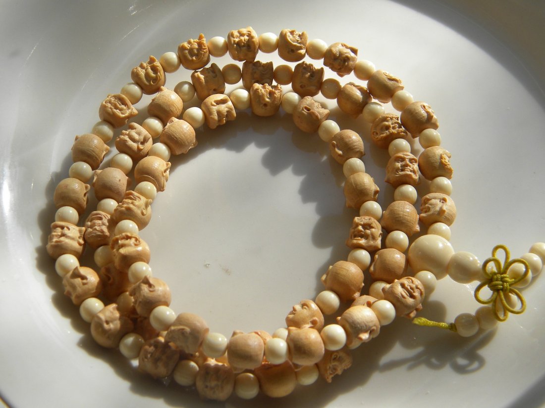 CHINESE 108 BUDDAH'S FACES BUDDHIST PRAYER BEADS WITH: CHINESE 108 BUDDAH'S FACES BUDDHIST PRAYER BEADS WITH WHITE BEADS, LENGTH 34"